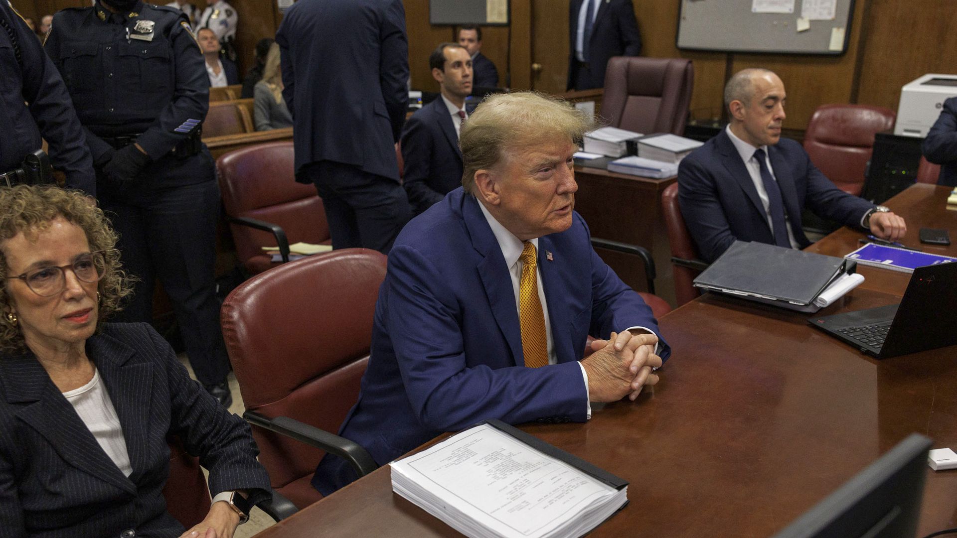 : Former U.S. President Donald Trump and attorneys Susan Necheles, and Emil Bove attend his trial for allegedly covering up hush money payments at Manhattan Criminal Court on May 7, 2024 in New York City.