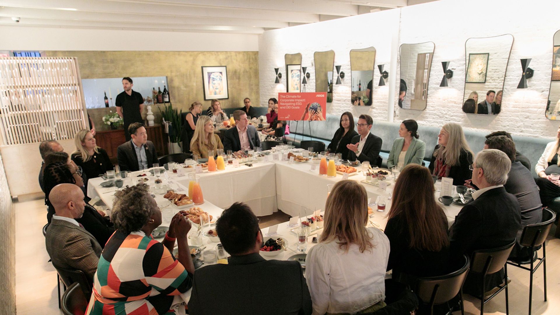 Roundtable discussion on corporate impact at this morning's Axios event sponsored by PwC. Photo: Steven Duarte