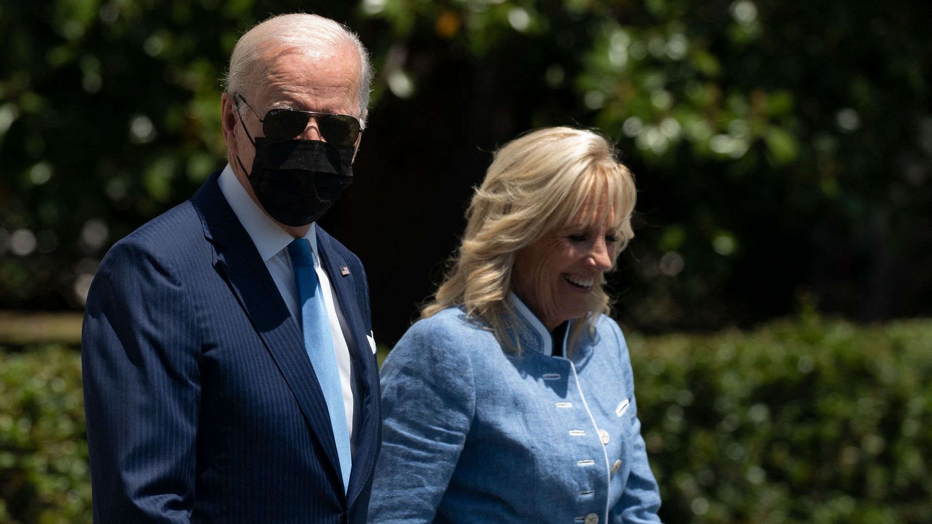 President Biden is seen walking to Marine One with first lady Jill Biden.