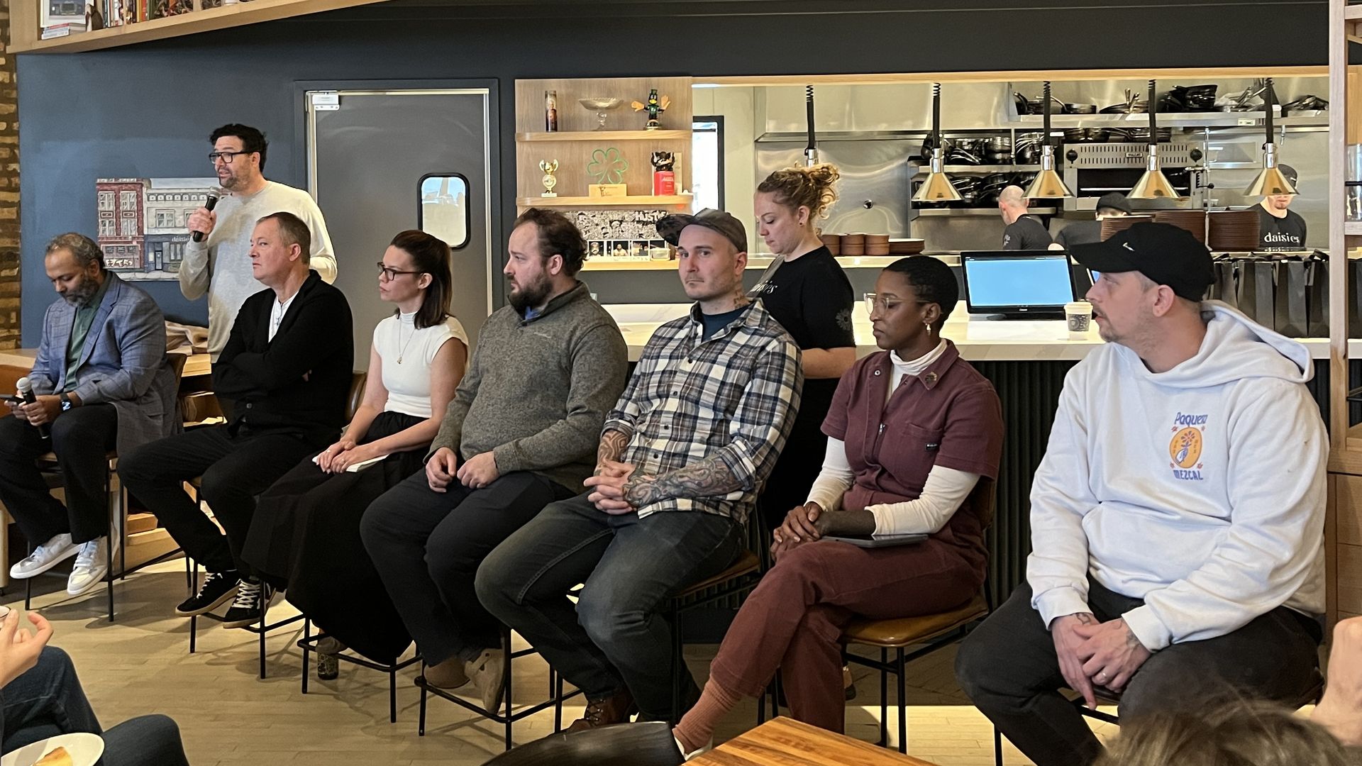 chefs sitting on chairs