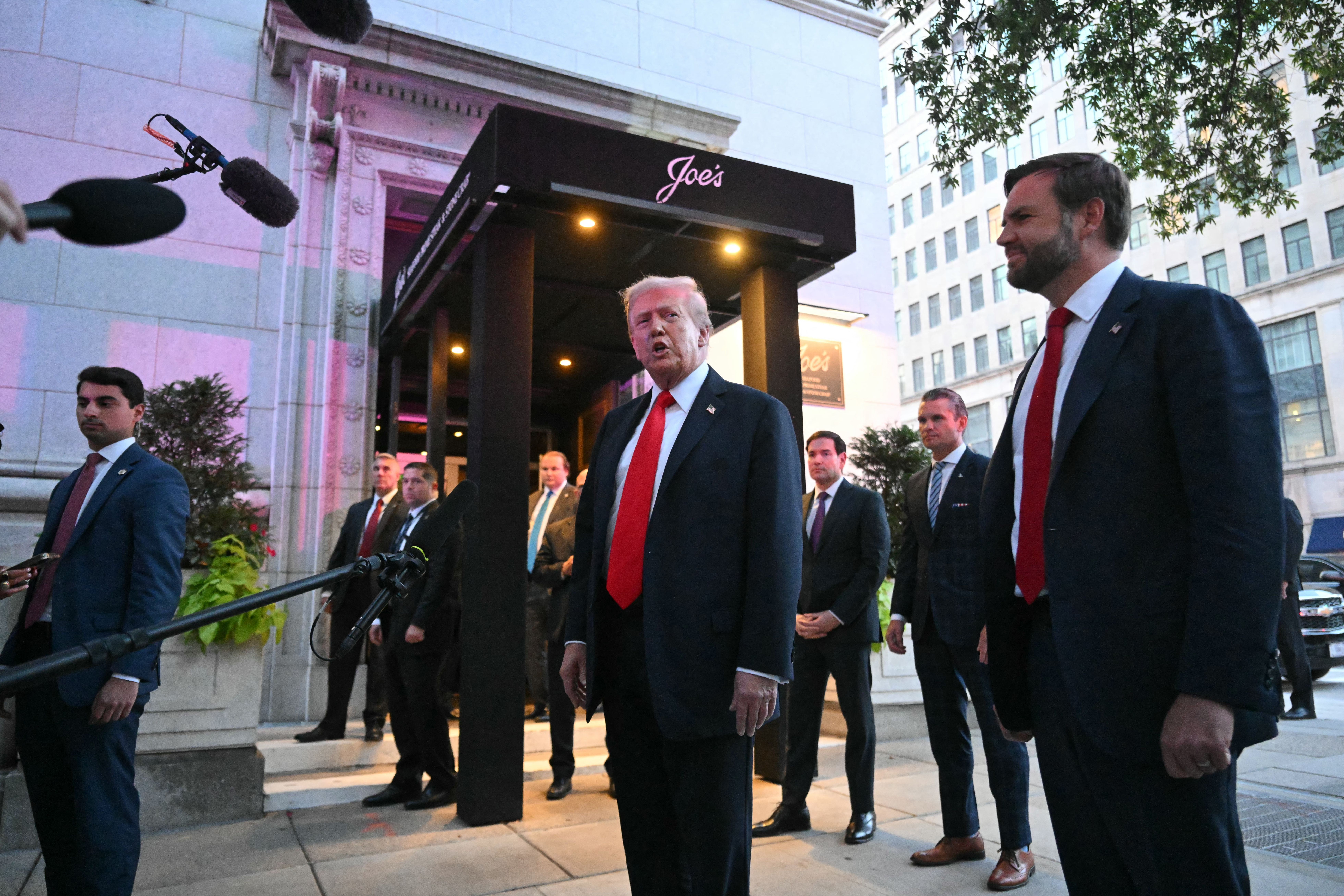 President Trump speaks to reporters before dining at Joe's Seafood, Prime Steak & Stone Crab near the White House last month.