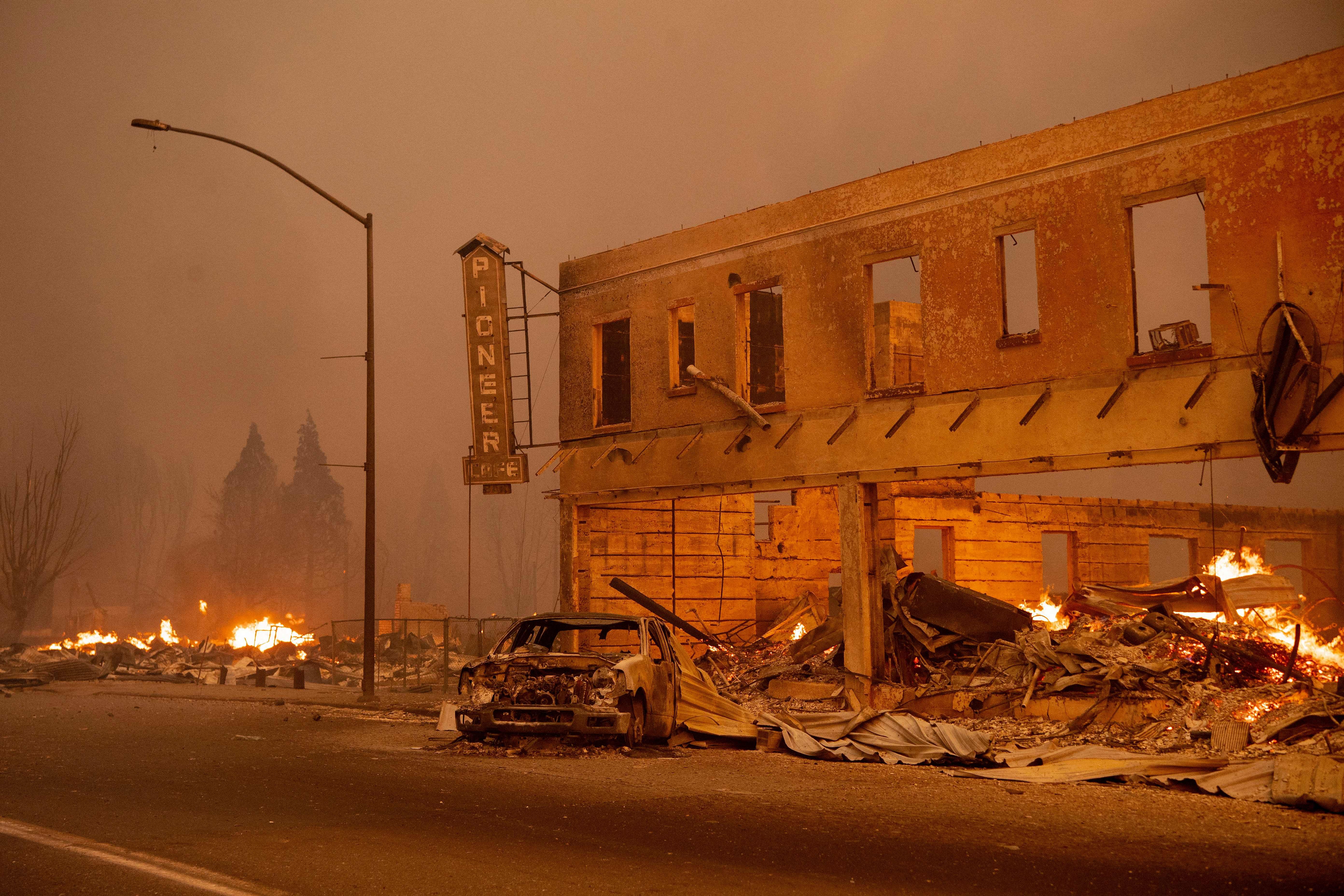 Businesses burn as the Dixie fire tears through downtown Greenville, California on Aug. 4.