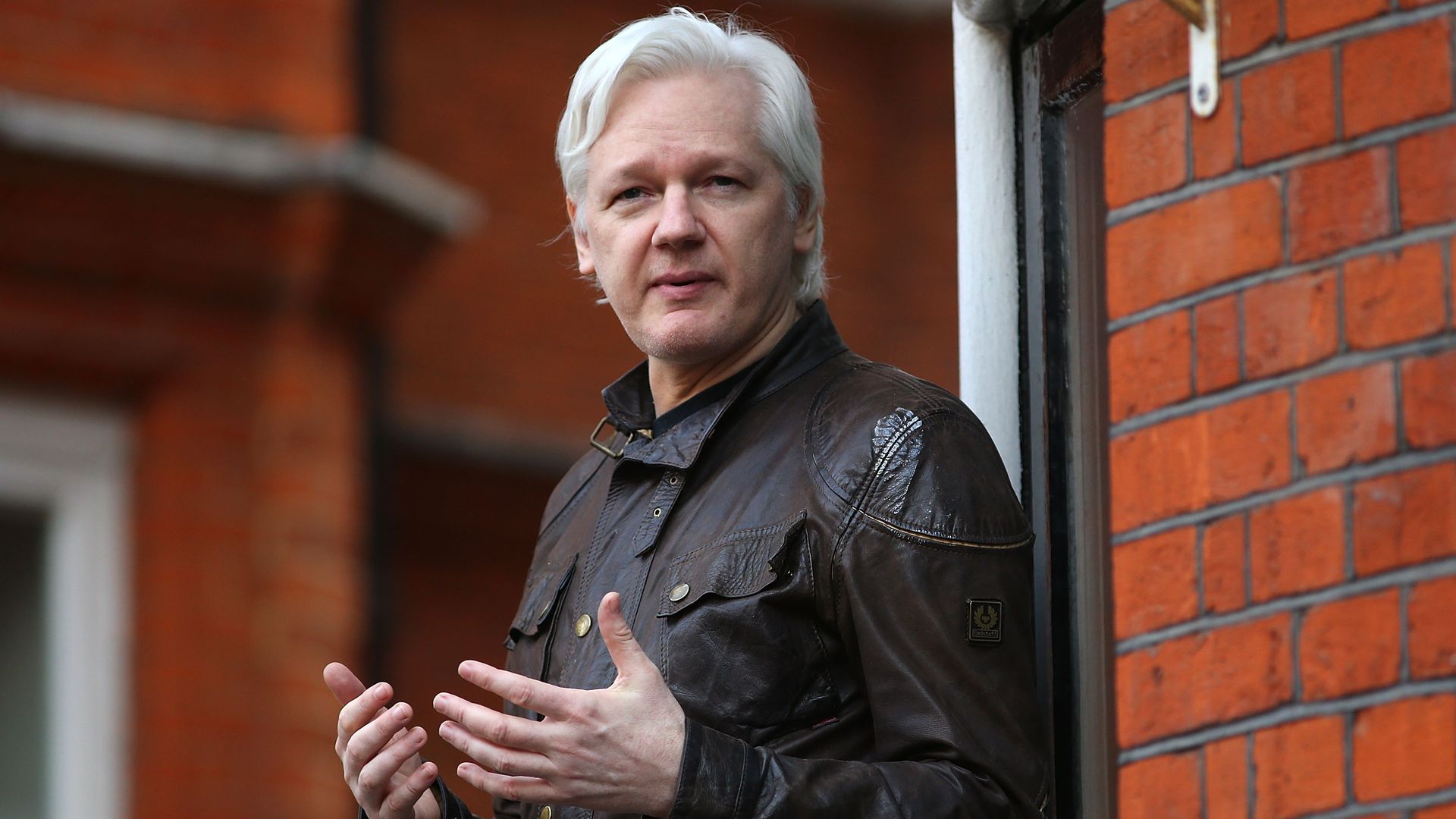 Julian Assange speaks to the media from the balcony of the Ecuador's embassy in London in May 2017.