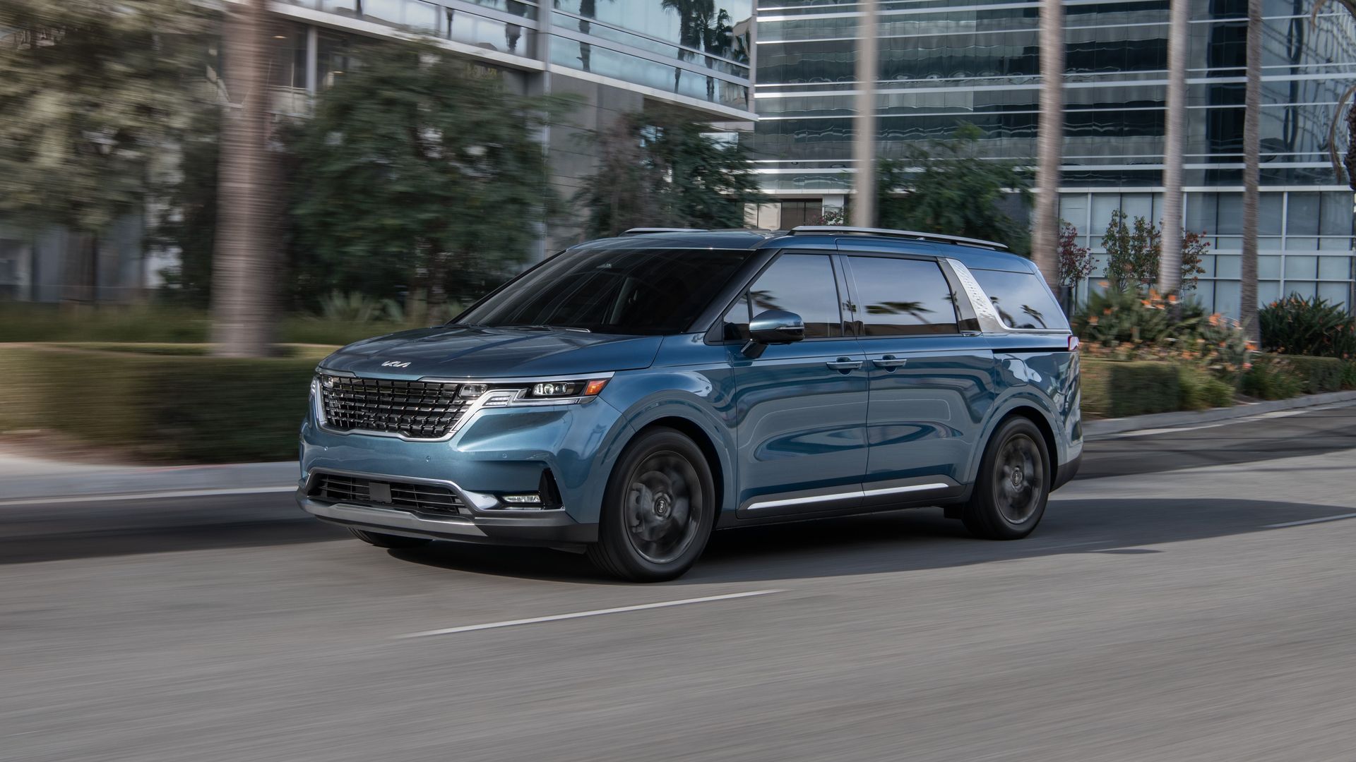 Image of a blue 2022 Kia Carnival minivan