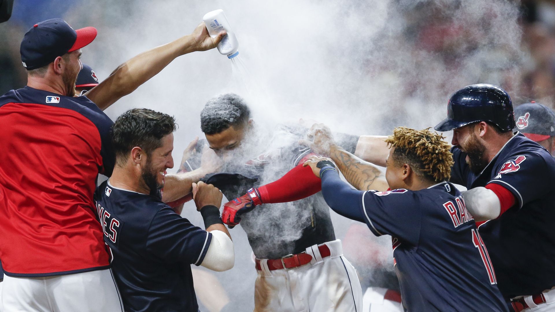 Francisco Lindor is mobbed by his teammates