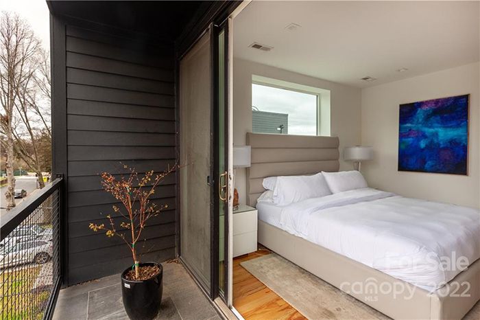 604 Mahopac St, bed and balcony