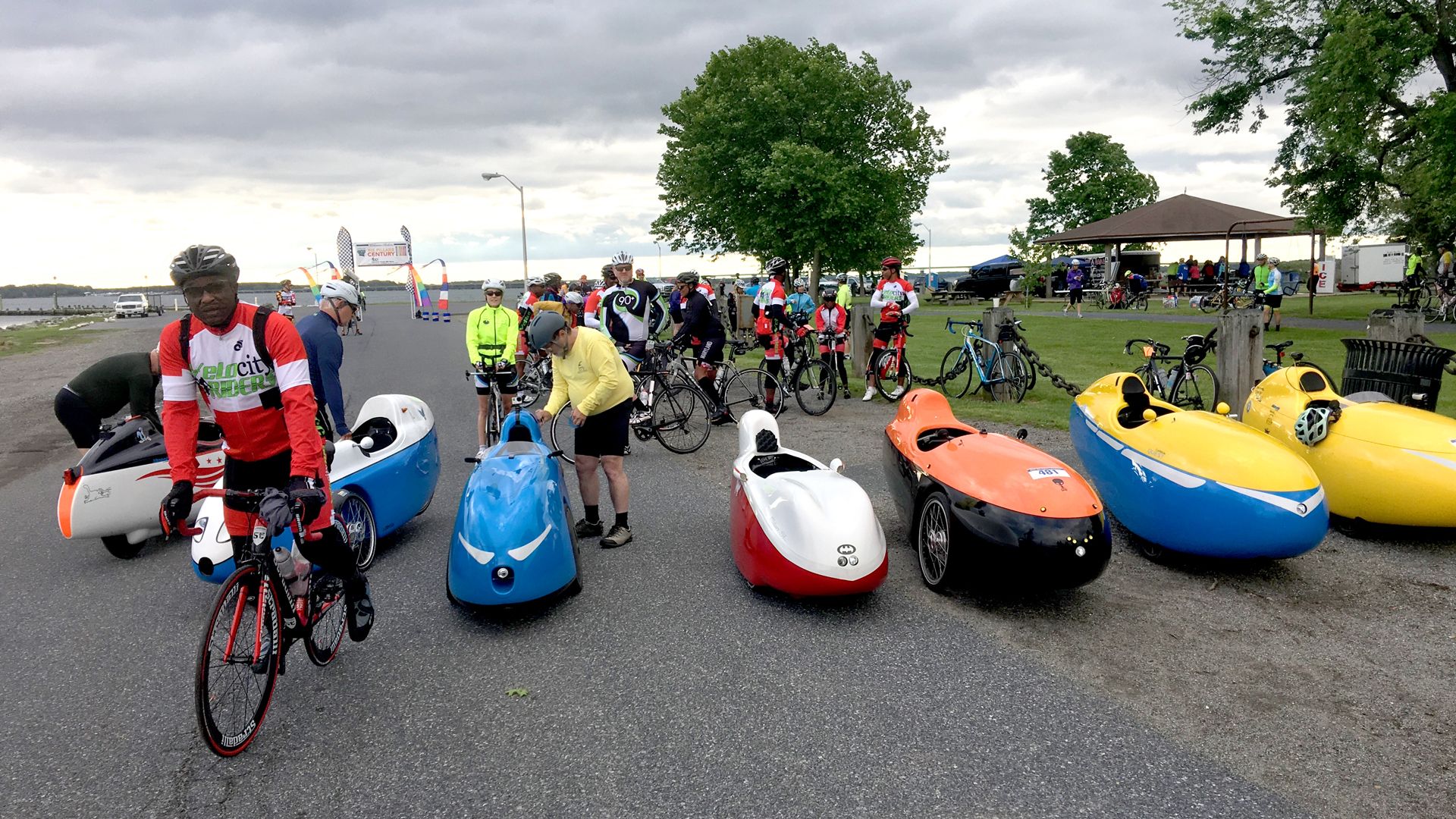 A group of velomobiles, or bicycle cars