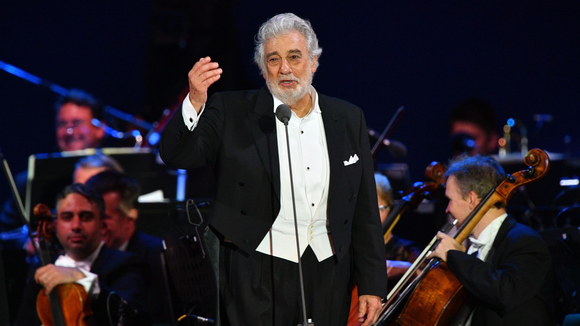 Spanish tenor Placido Domingo gestures as he performs during his concert in the newly inaugurated sports and culture centre 'St Gellert Forum' in Szeged, southern Hungary