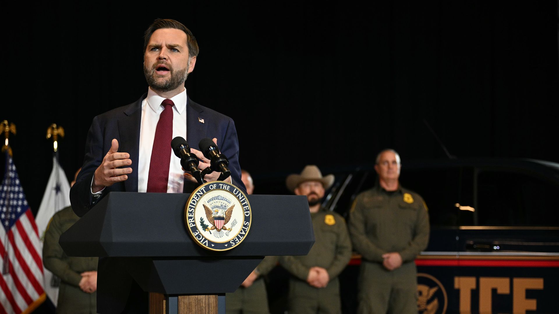 J.D. Vance speaking behind a podium