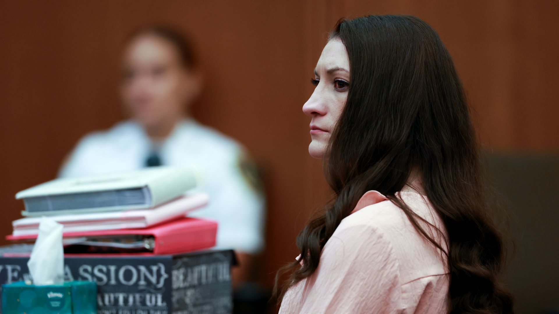Lindsay Clancy, a Duxbury mother of three accused of murdering her three children in early 2023, sits at the defense table in Plymouth Superior Court and looks on as she listens to testimony.