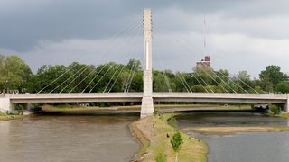 A wide shot of a cable bridge over a river in Columbus, Ohio. 