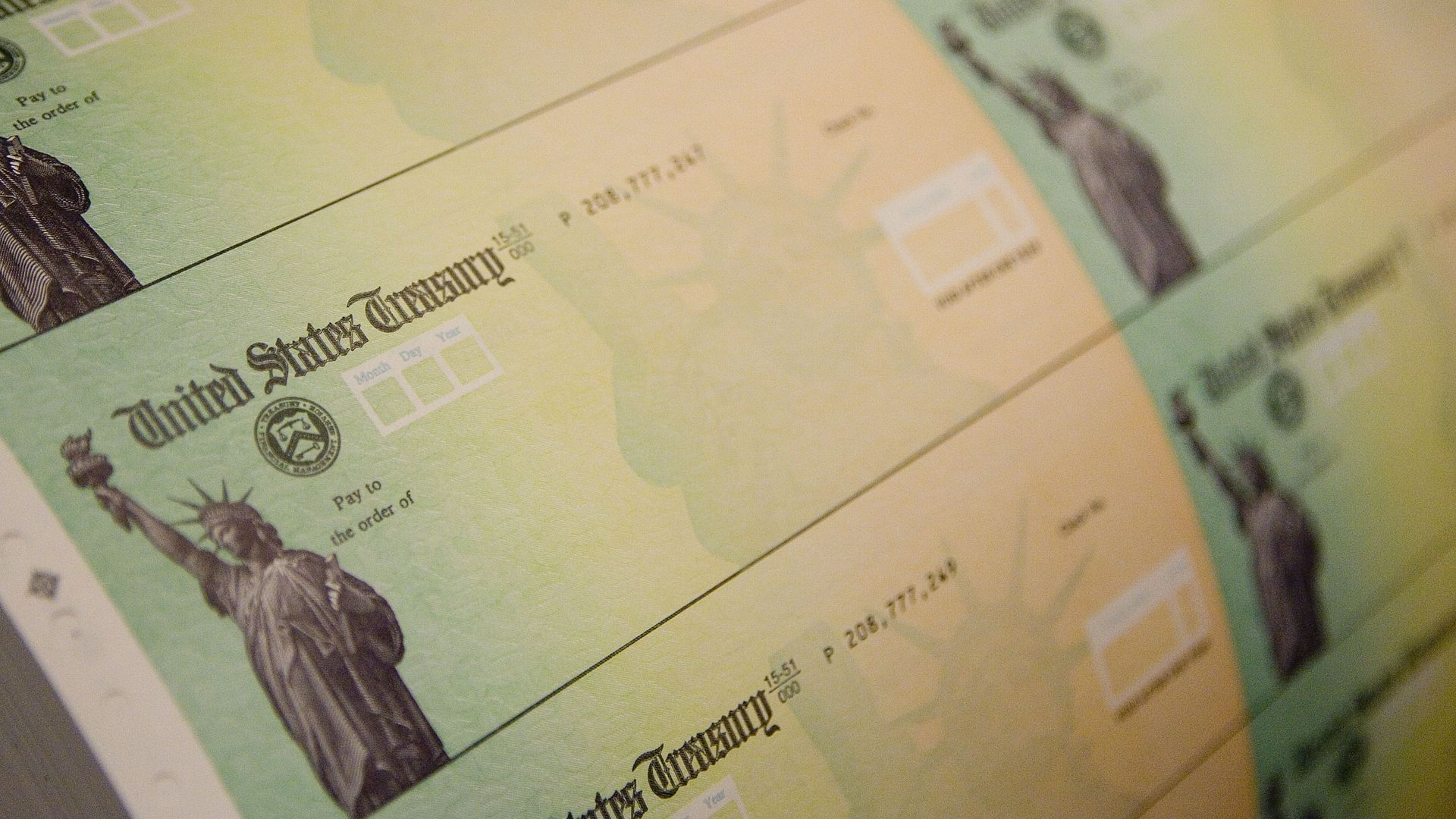 Economic stimulus checks are prepared for printing at the Philadelphia Financial Center May 8