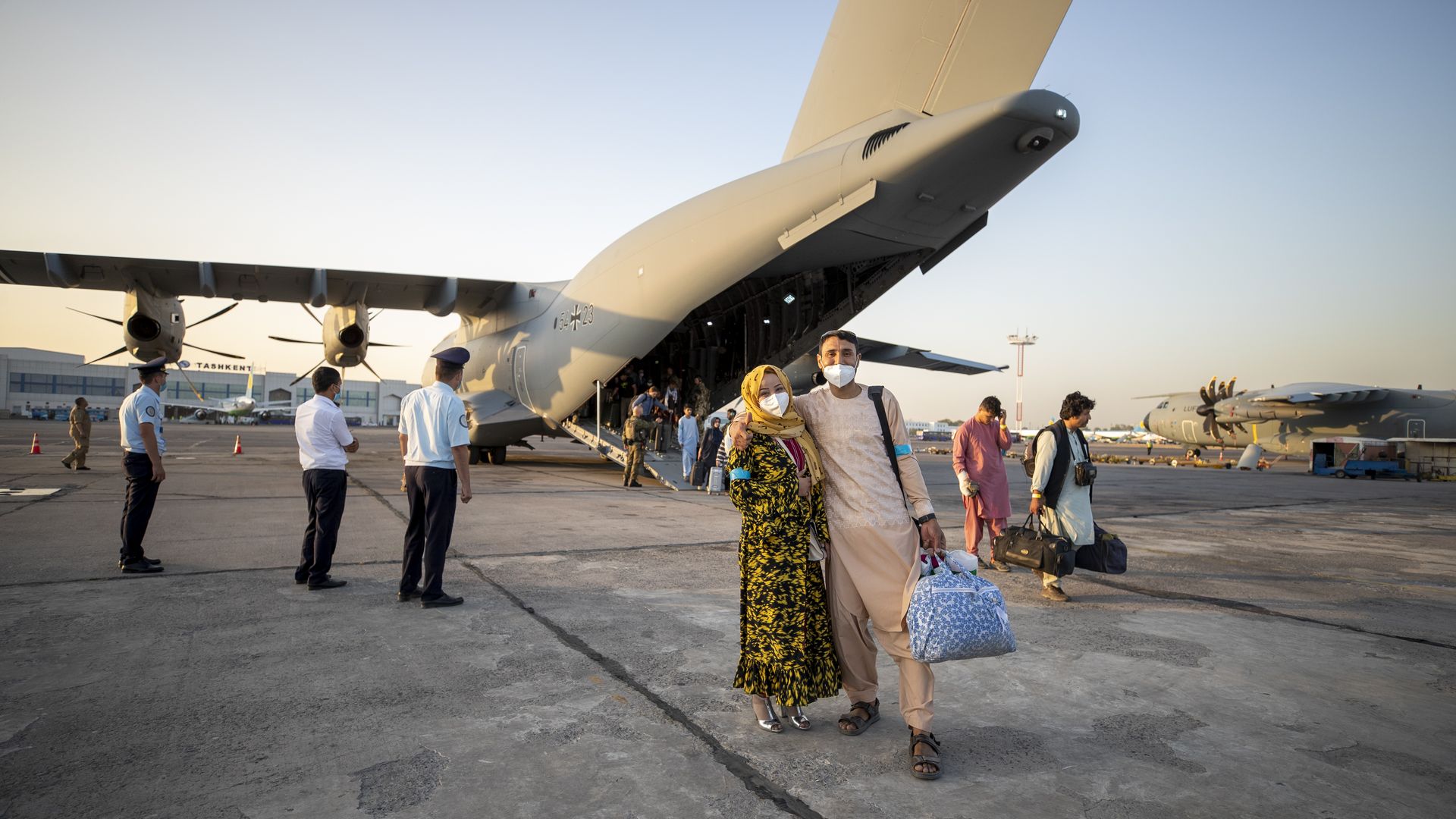 Handout image of evacuees from Kabul in Tashkent, Uzbekistan. (Photo: Marc Tessensohn/Bundeswehr via Getty Images)
