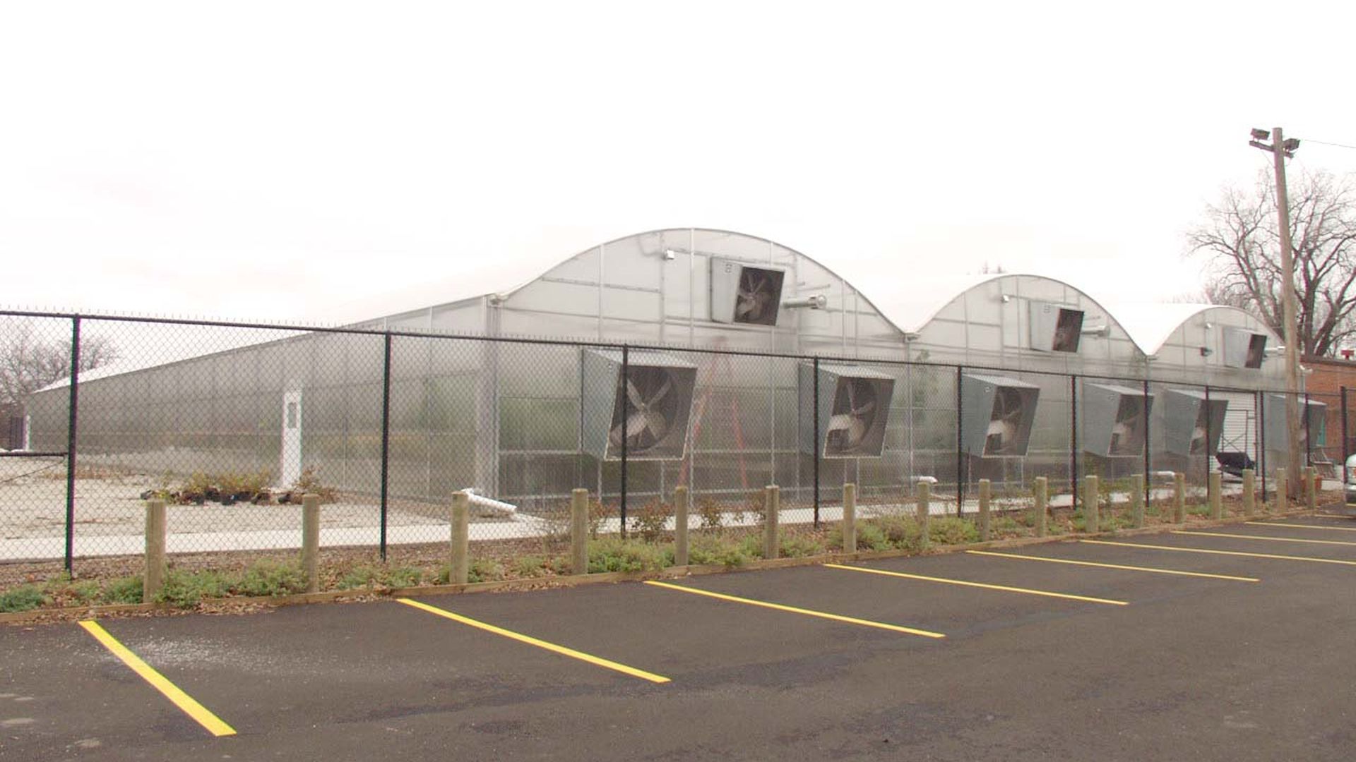 A photo of Des Moines' current greenhouses at 2501 Maury St.
