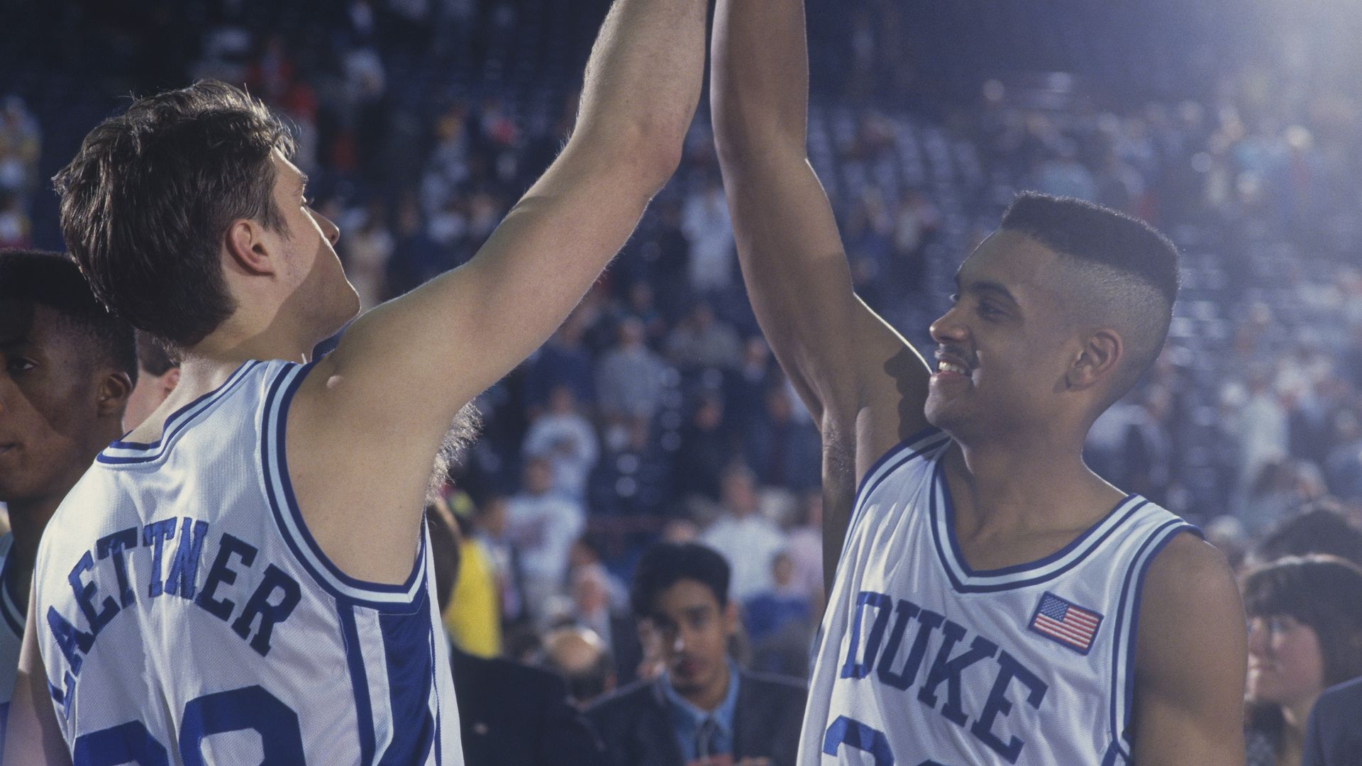 Duke players high-five