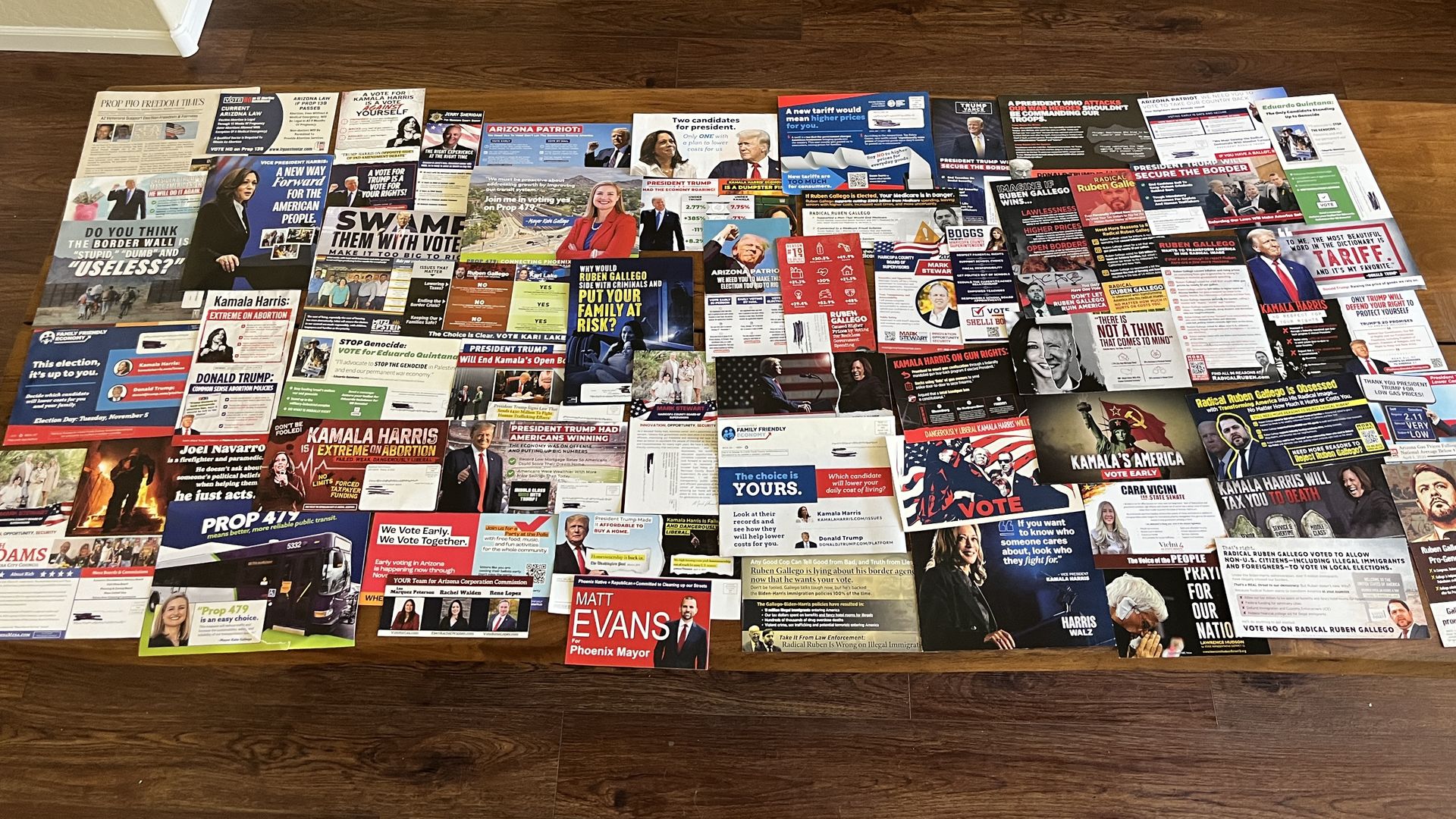 A table filled with campaign mailers. 