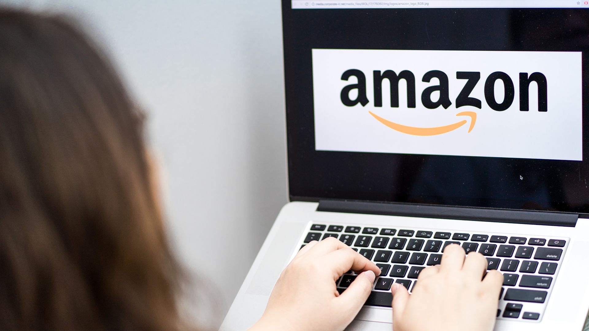 A using a Mac book pro as she uses Amazon website on January 18, 2017 in Hong Kong, Hong Kong.