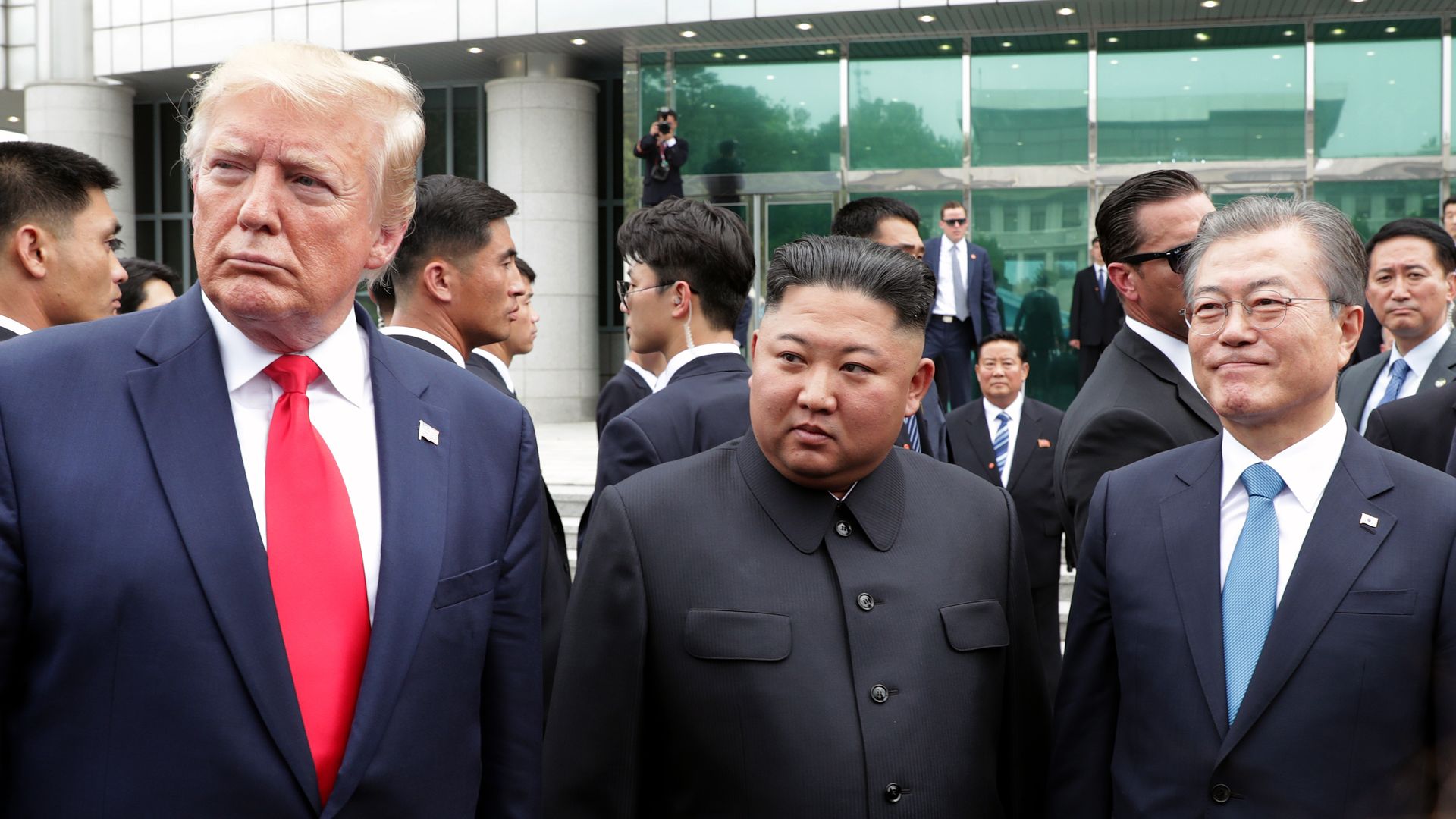 North Korean leader Kim Jong Un, U.S. President Donald Trump, and South Korean President Moon Jae-in inside the demilitarized zone.
