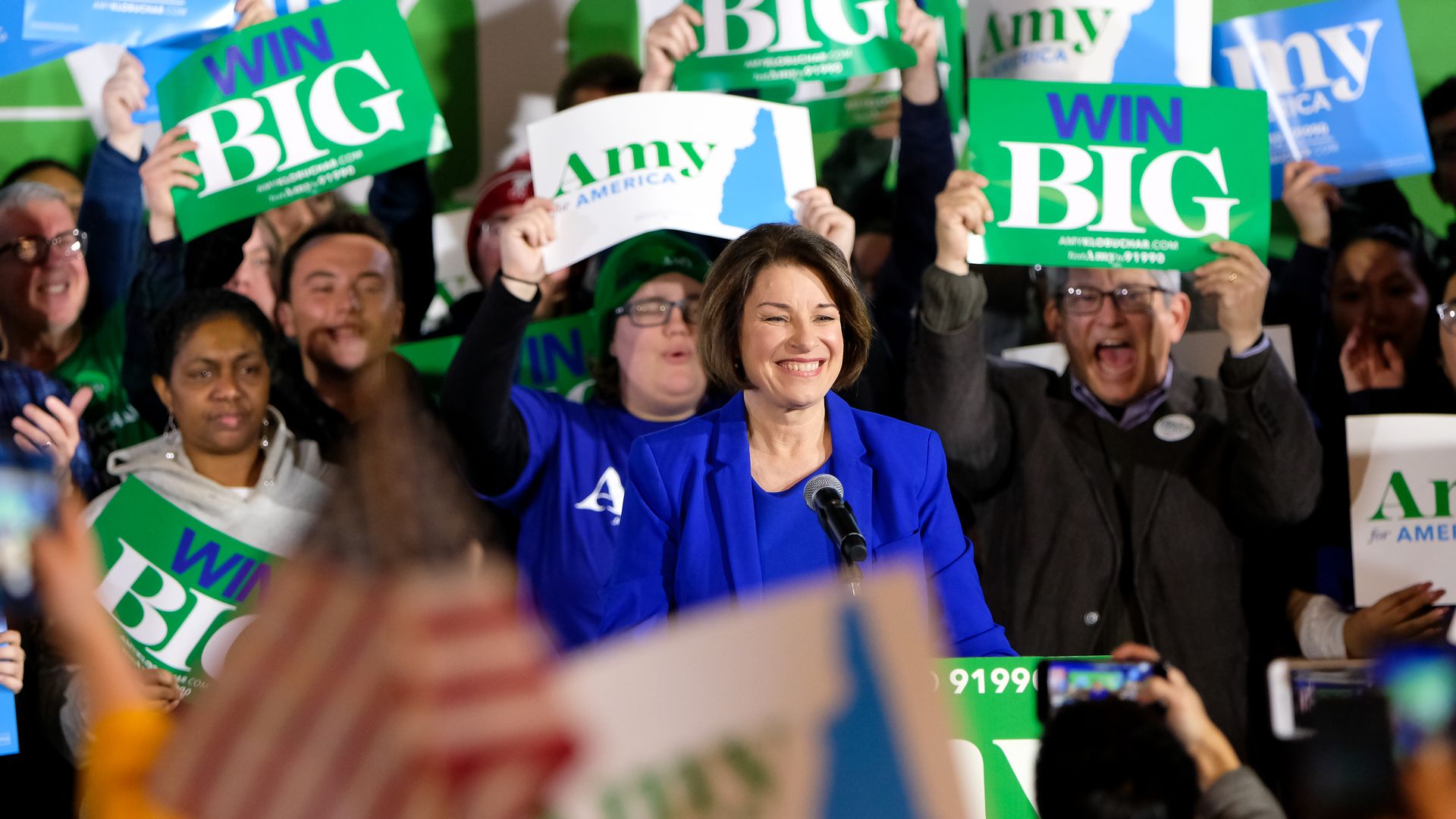 Amy Klobuchar celebrating with supporters after third-place finish in the New Hampshire Primary