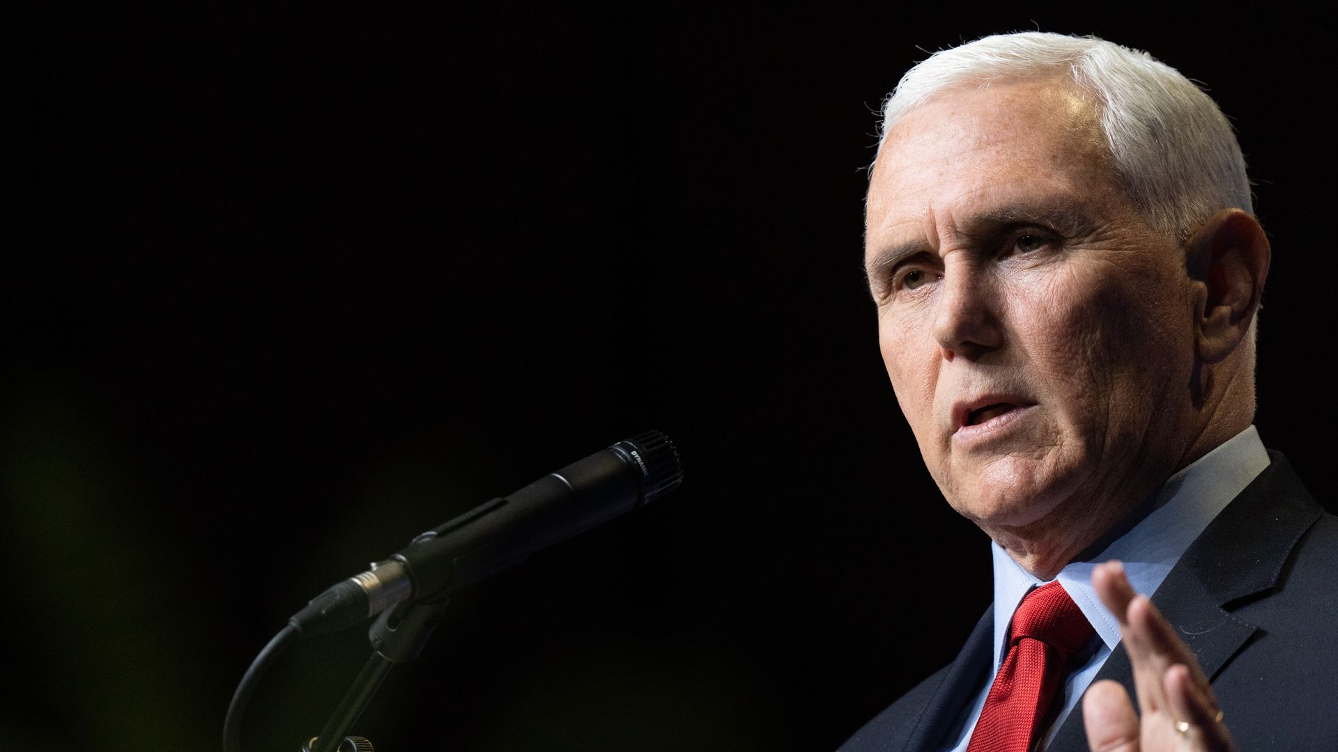 Former Vice President Mike Pence speaks to a crowd.