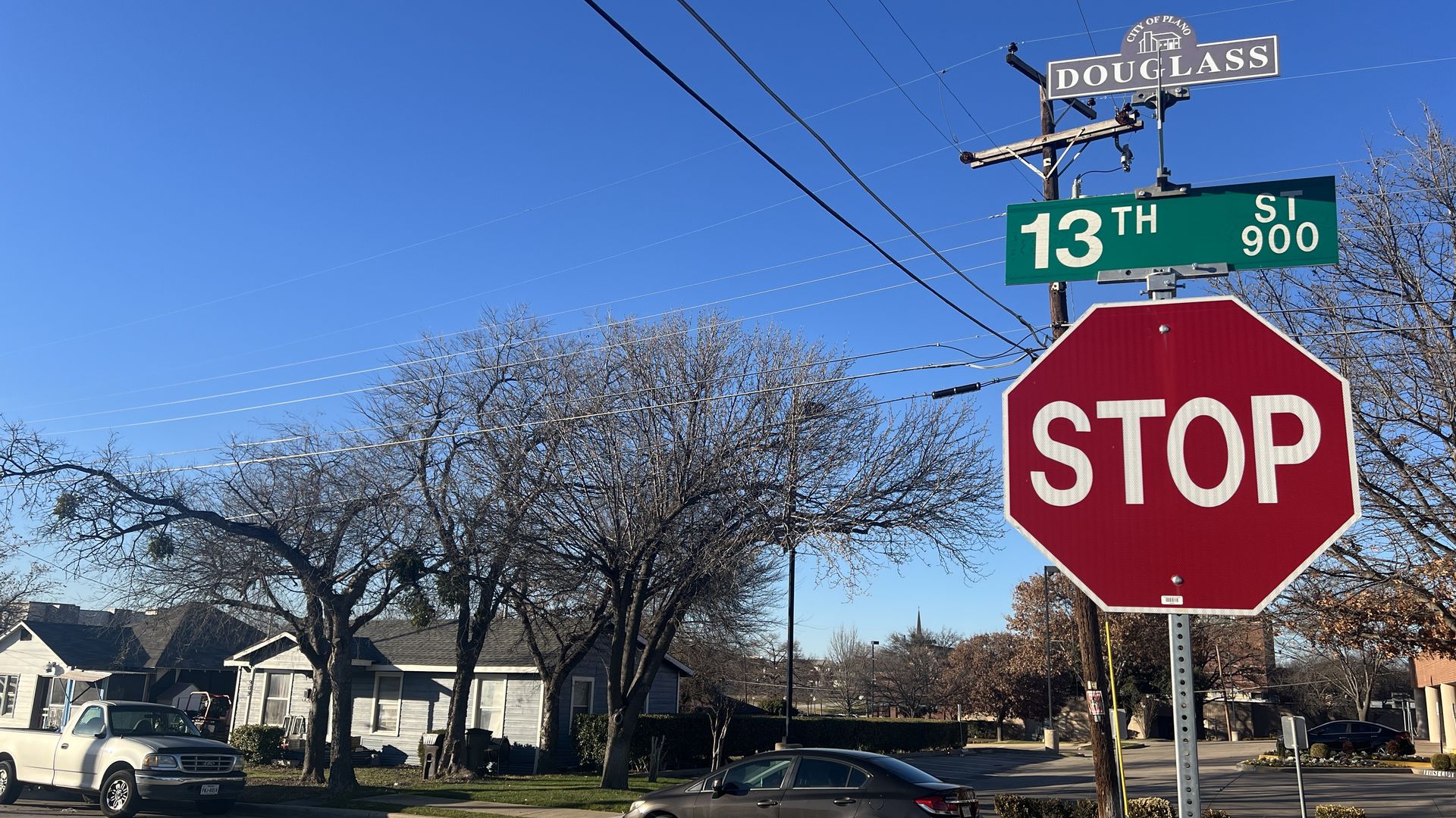 A stop sign with a street name that says Douglass