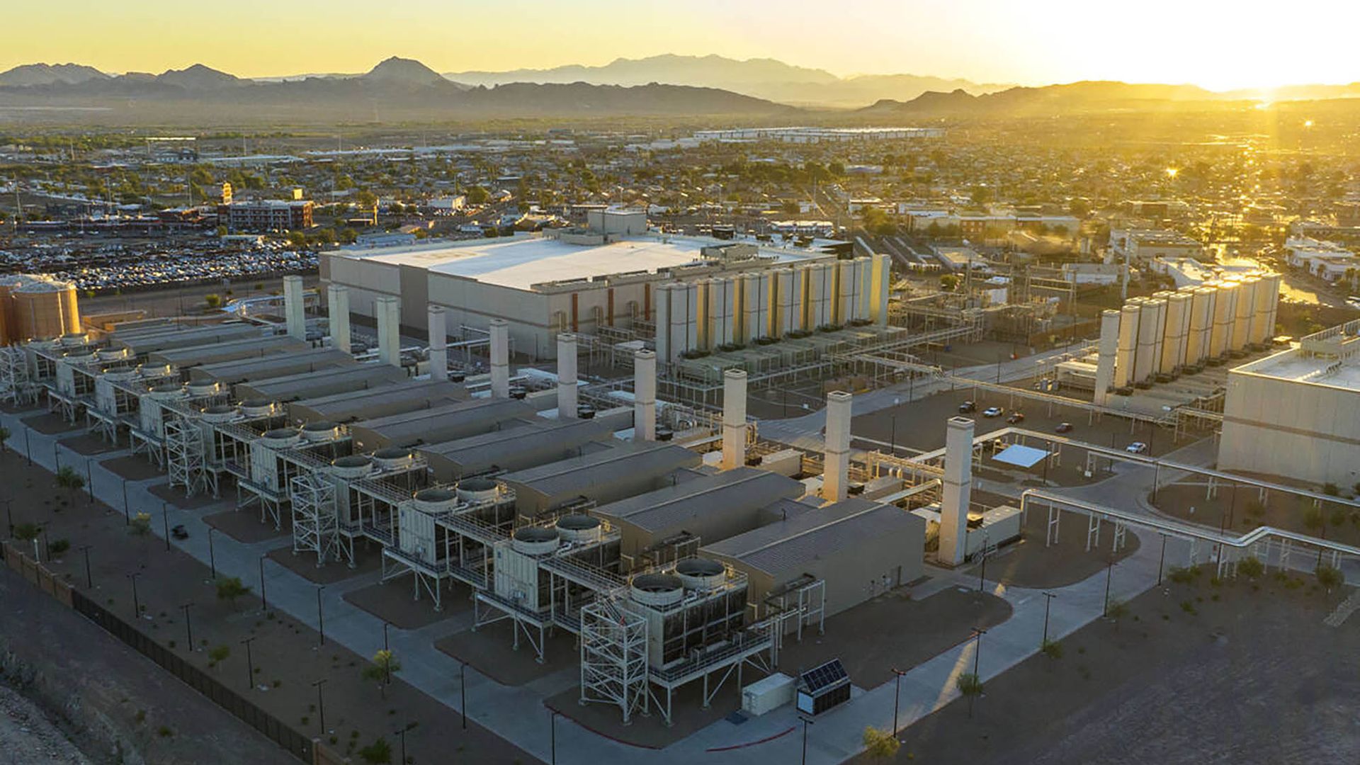 an aerial view of a data center at sunset