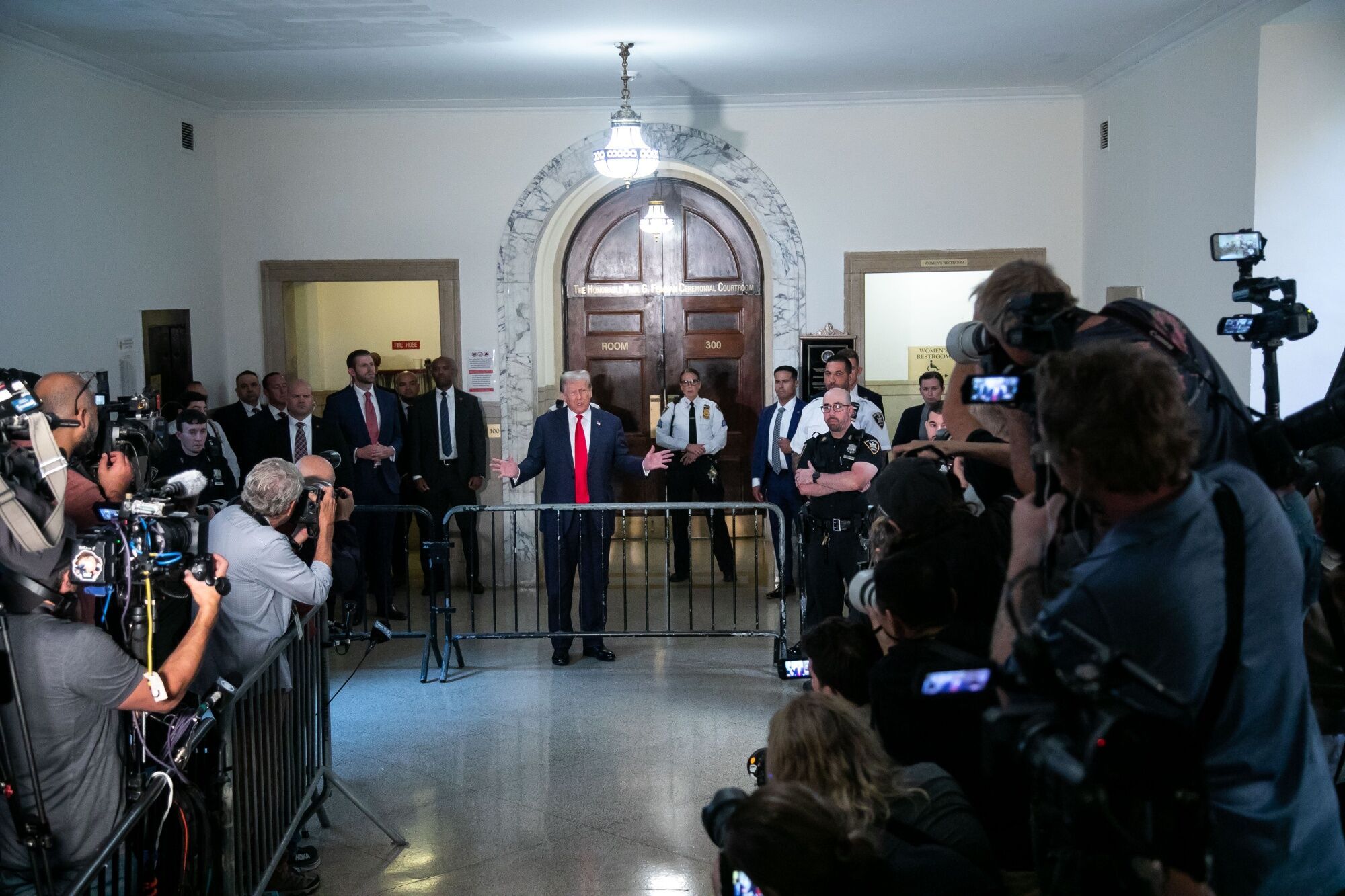 Former President Trump speaks to members of the media at New York State Supreme Court today.