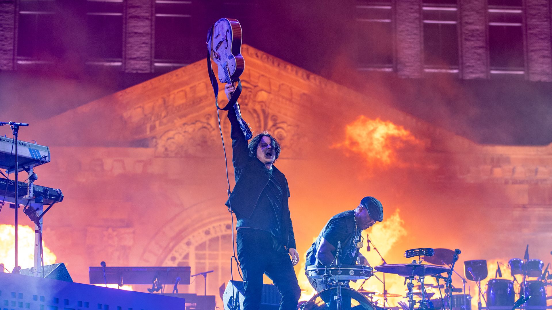Jack White of the White Stripes performs onstage at a June concert in front of Michigan Central Station. 