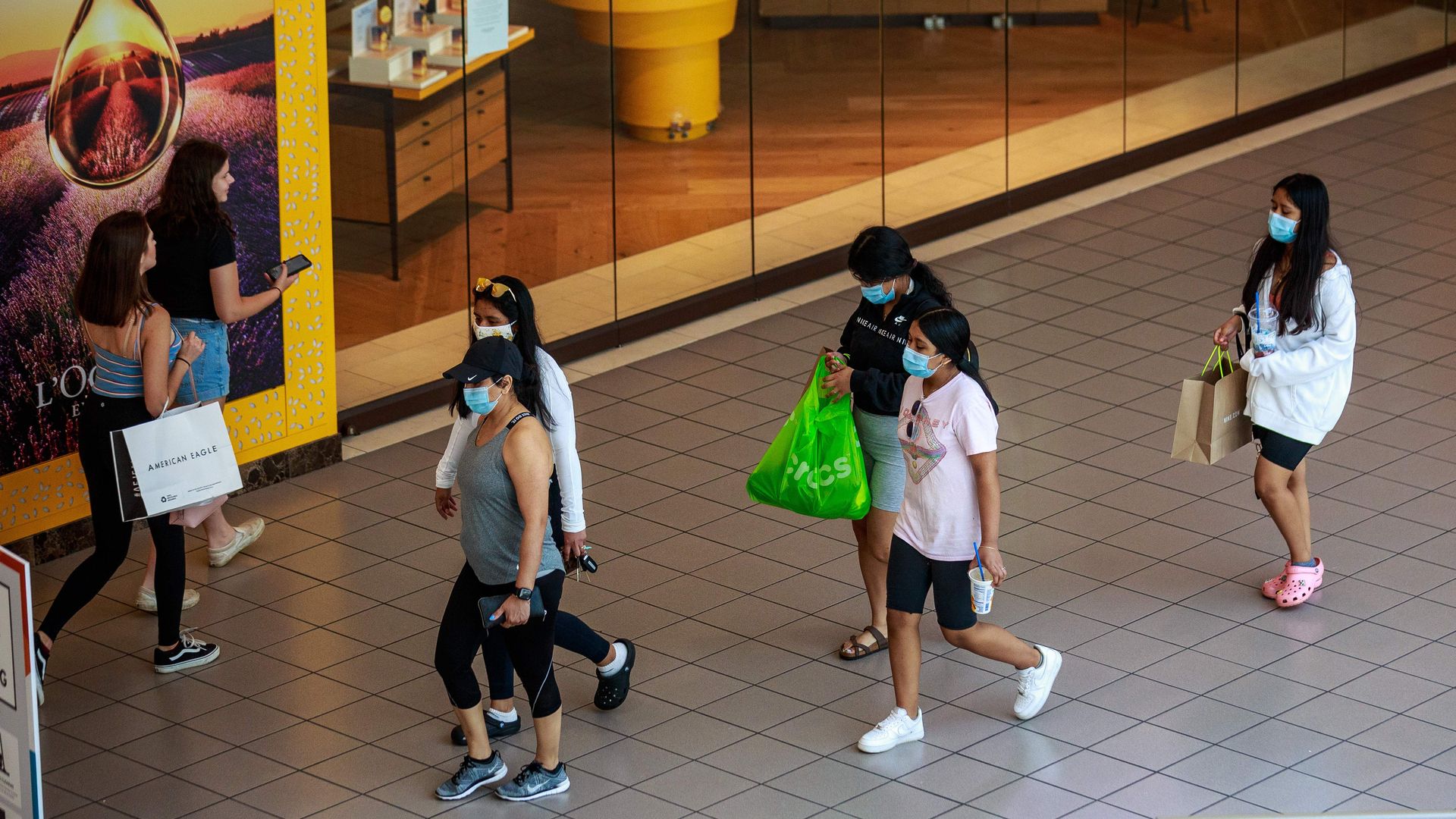 Shoppers wear facemasks at the Mall of America 