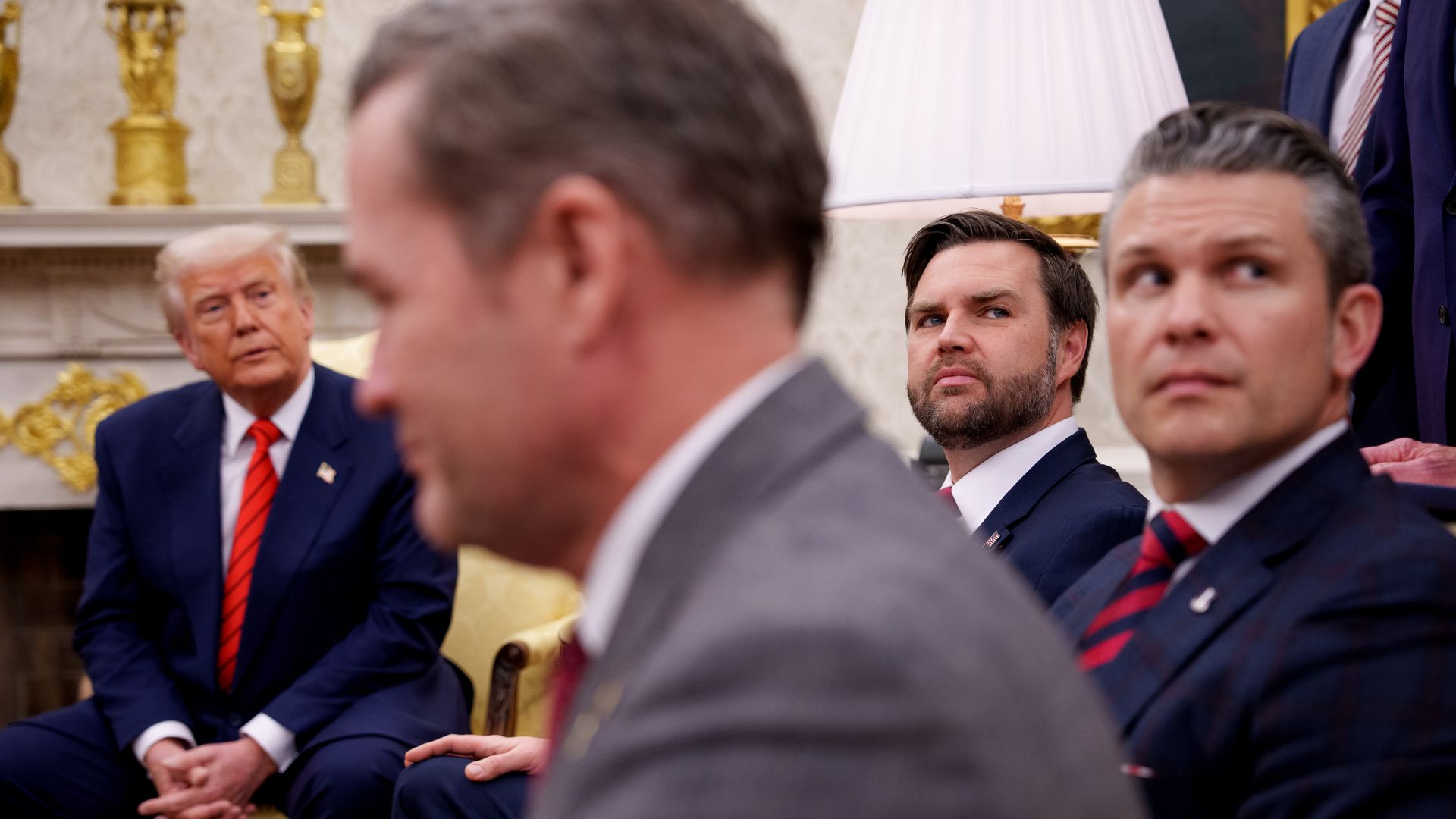 Waltz foregrounded with trump vance and hegseth