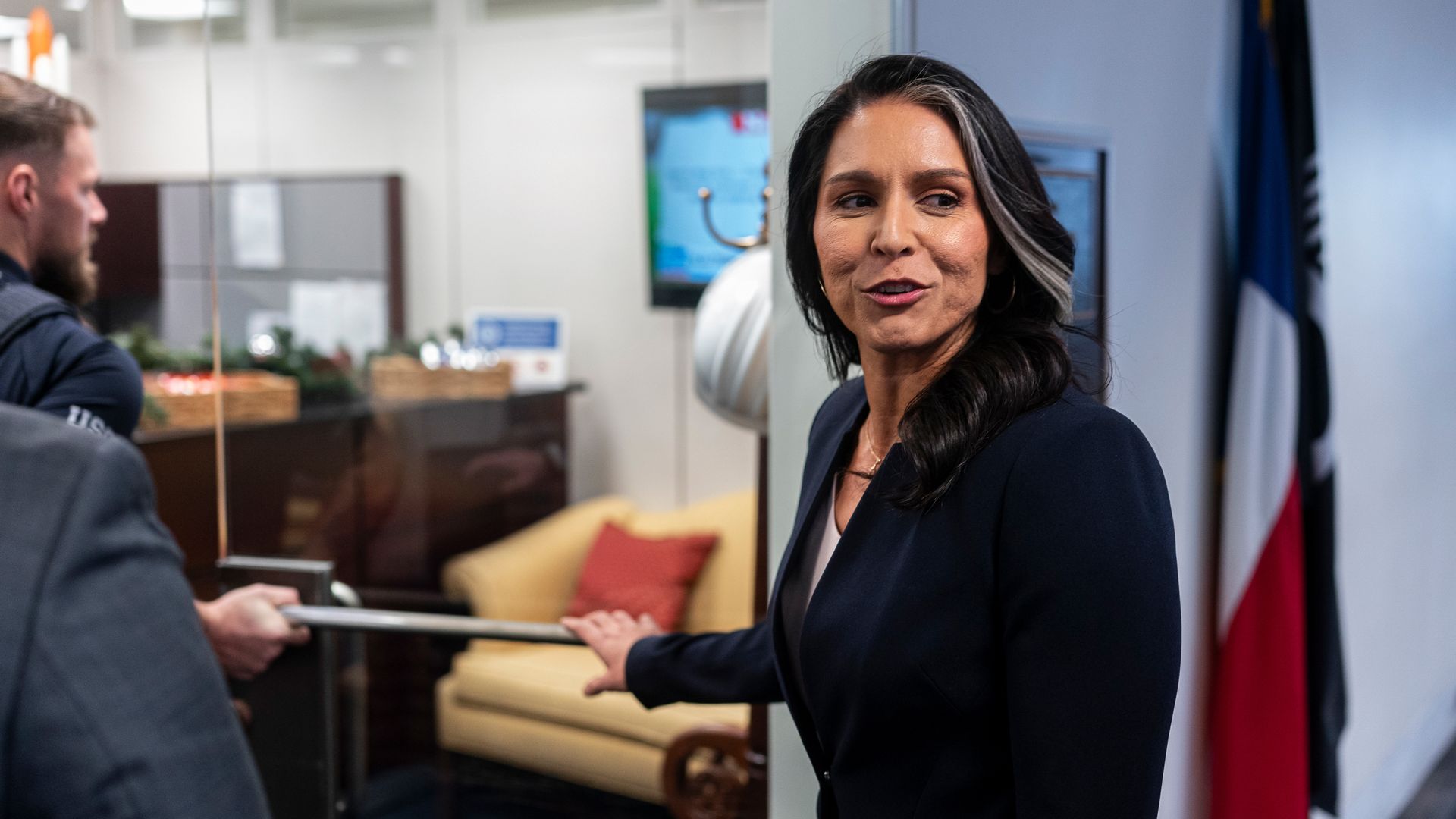 Tulsi Gabbard, former US Representative from Hawaii and US President-elect Donald Trump's nominee to be director of National Intelligence, arrives for a meeting with Senator John Cornyn, a Republican from Texas, not pictured, on Capitol Hill in Washington, DC, US, on Wednesday, Dec. 18, 2024.