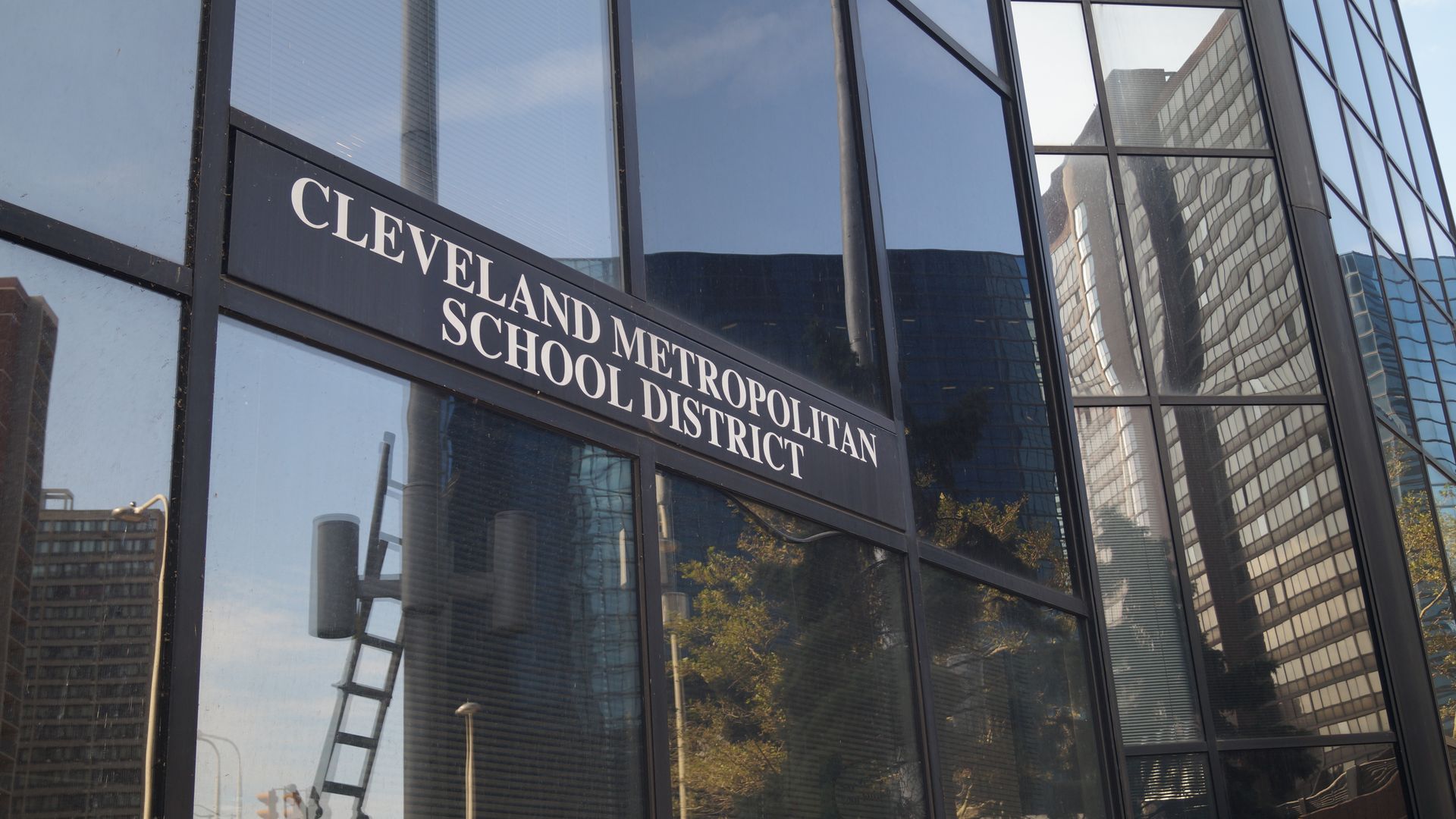 Building front with sign reading "Cleveland Metropolitan School District"