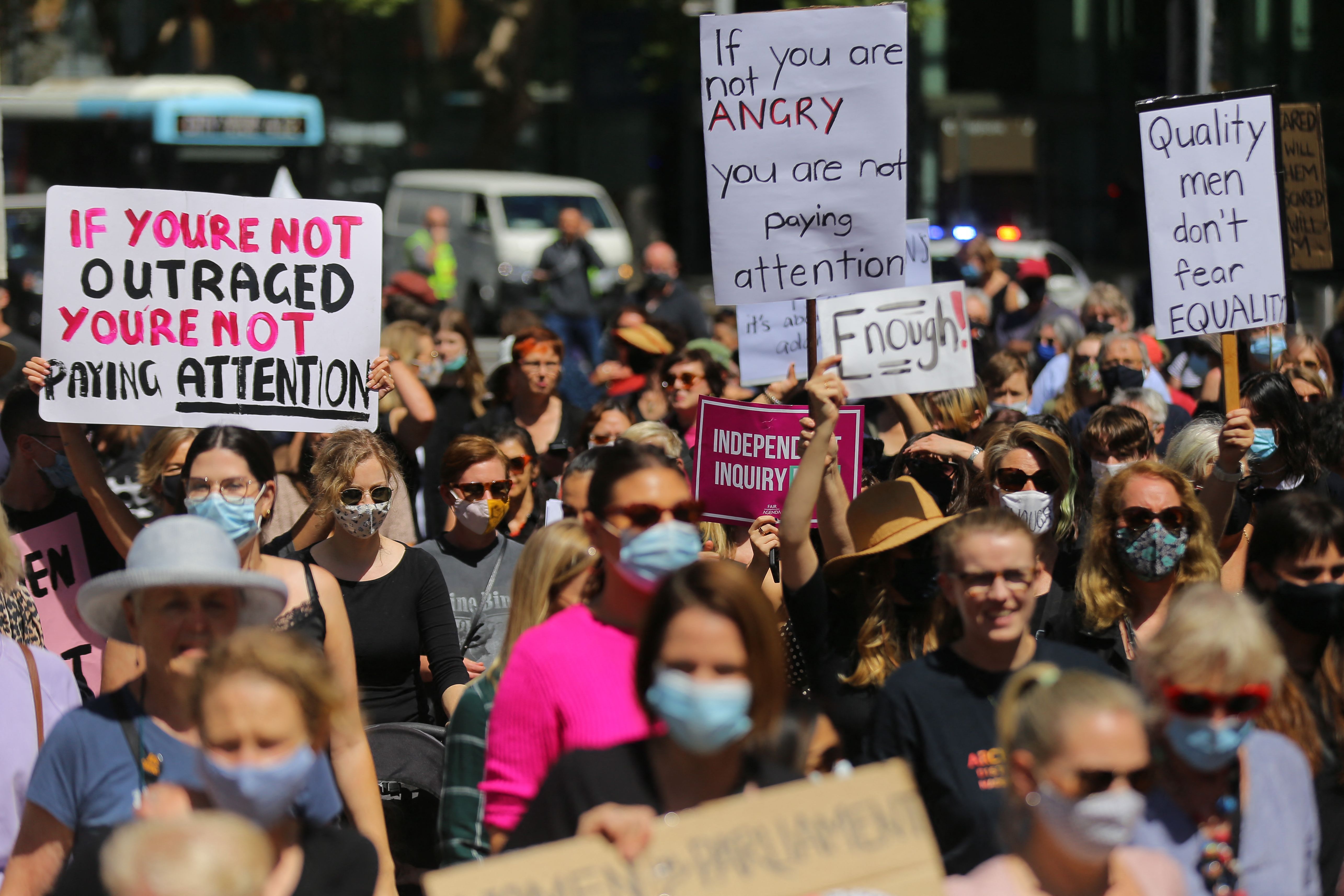  Protesters attend a rally against sexual violence and gender inequality in Sydney on March 15