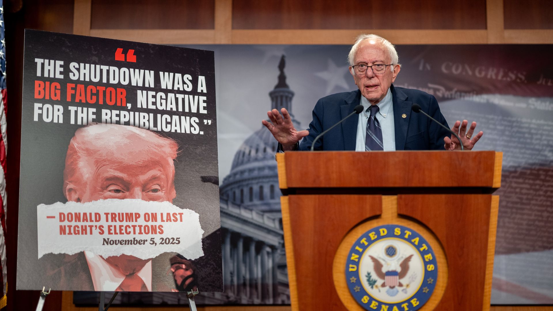 Sen. Bernie Sanders speaks at a podium during a Capitol news conference amid a record-long government shutdown.