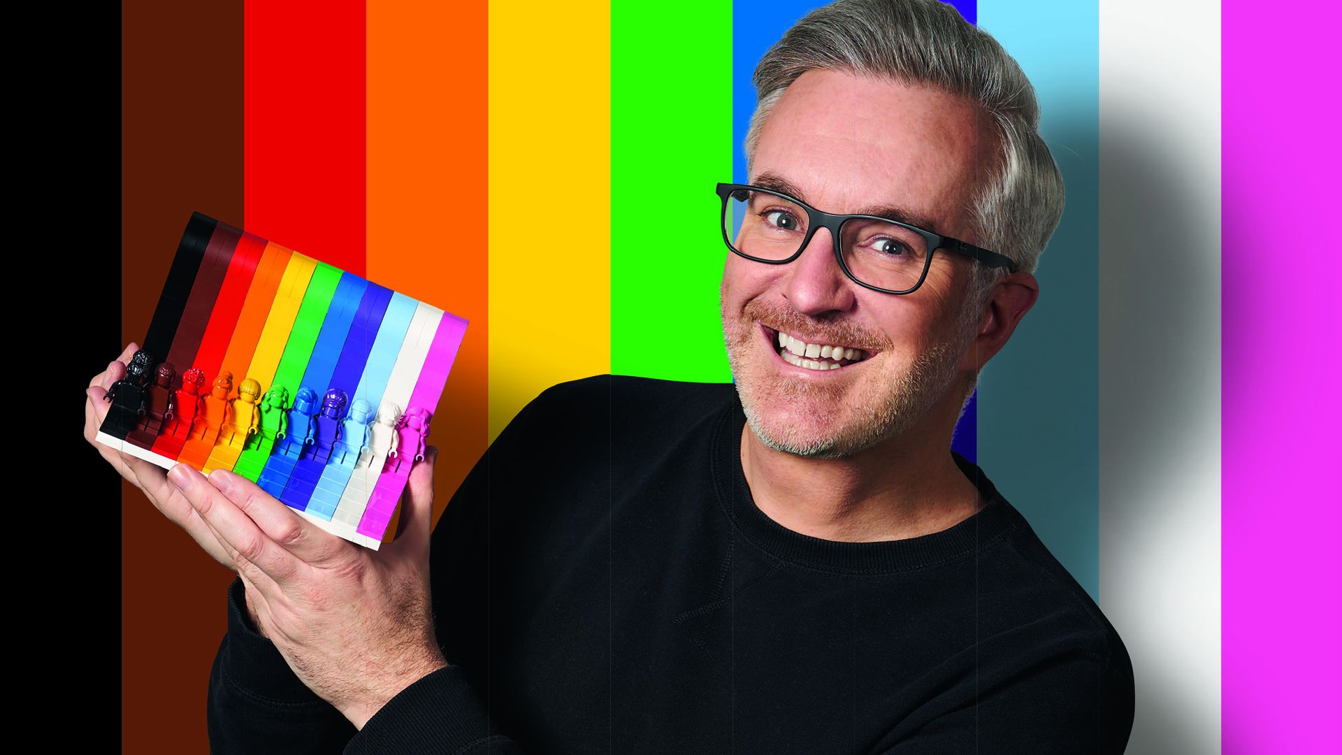 Lego designer Matthew Ashton shows off the company's new "Everyone is Awesome" set of mini figures in a rainbow of colors.