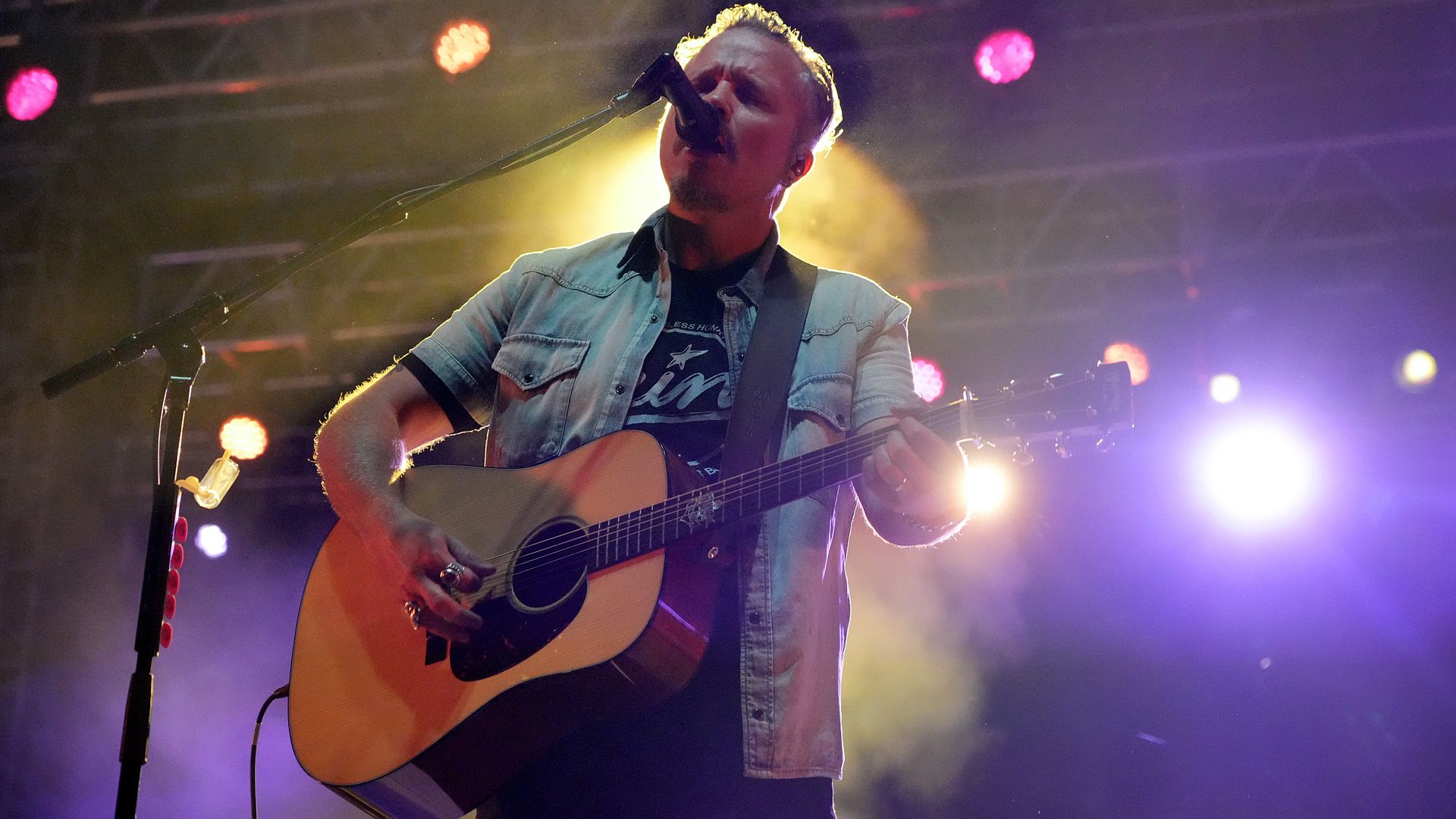 Guitarist Jason Isbell at a concert.