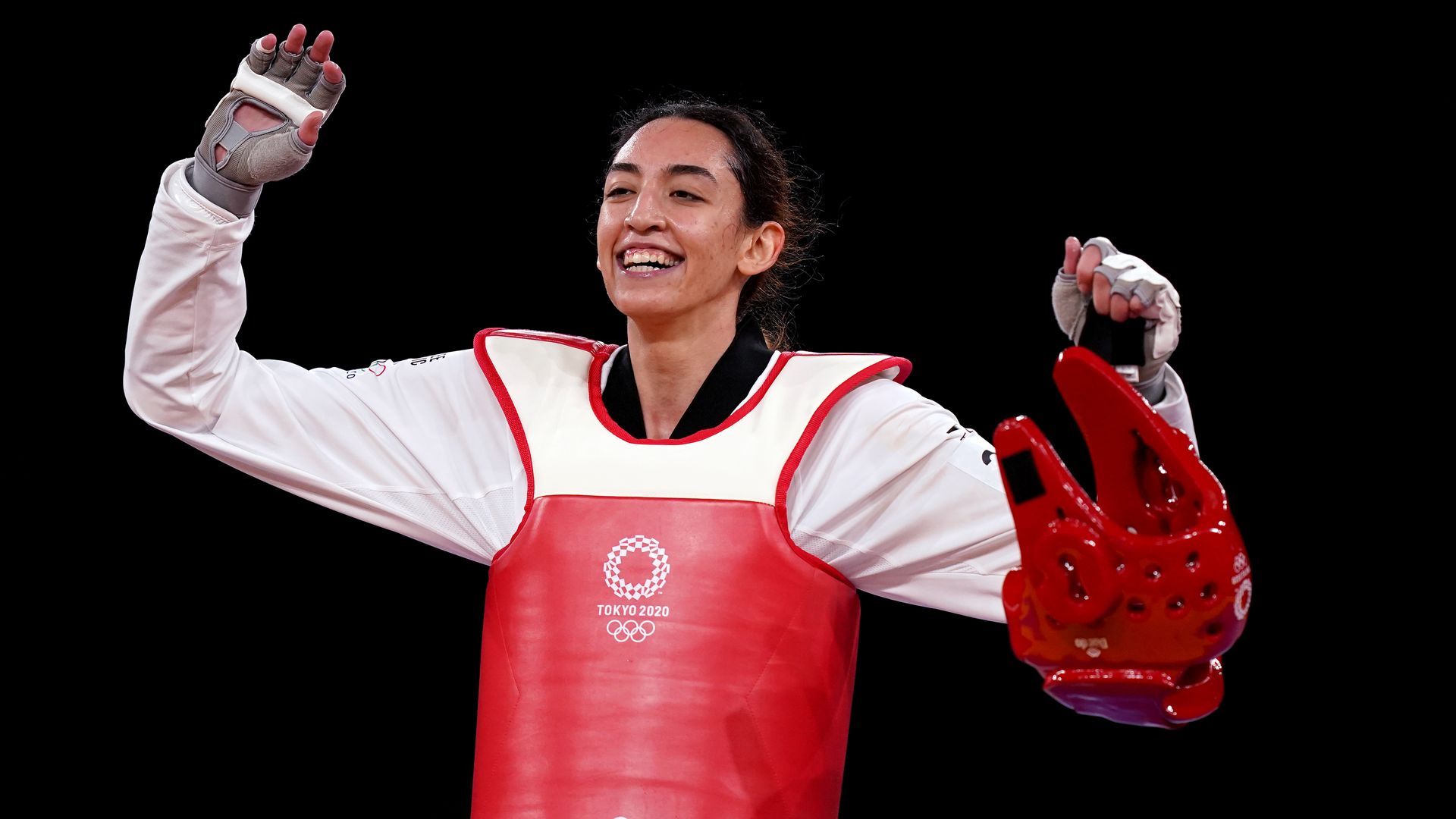 Refugee Olympic Team's Kimia Alizadeh Zonoozi after winning her Olympic Women's -57KG Round of 16 match against Great Britain's Jade Jones  in Japan, Sunday