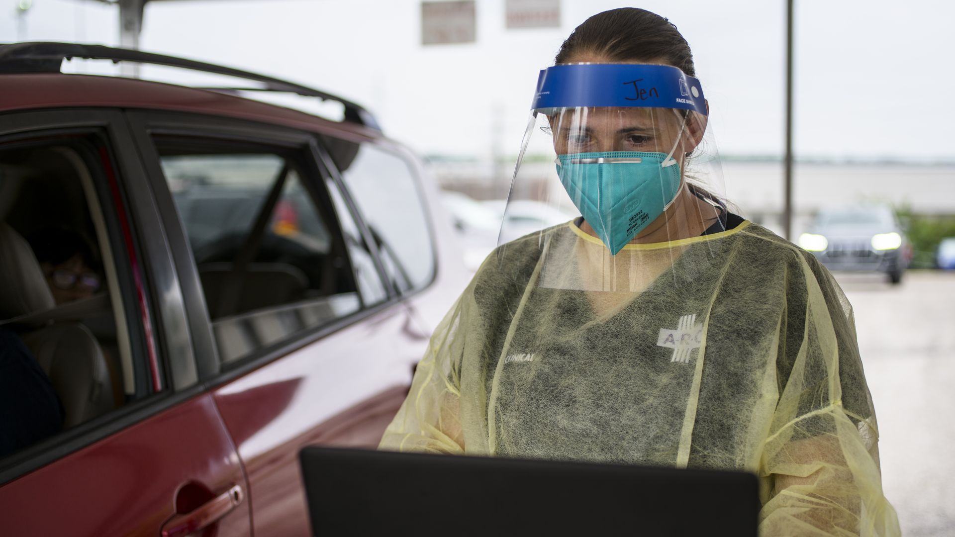 A healthcare worker registers a patient at the Austin Regional Clinic drive-thru Covid-19 vaccination and testing site in Austin, Texas, on Thursday, Aug. 5
