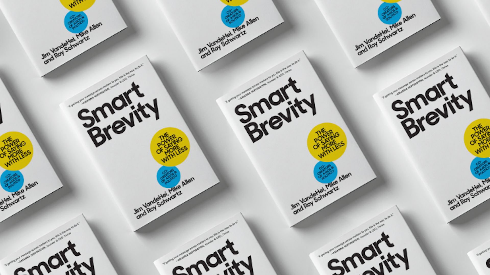 Several copies of the Smart Brevity book