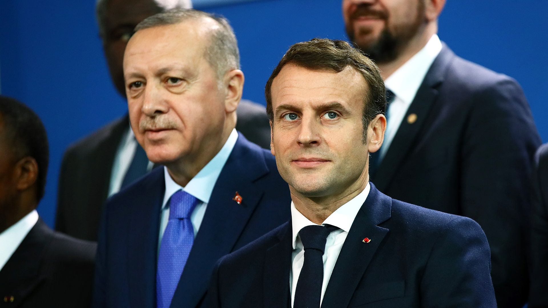 French President Emmanuel Macron (R) and Turkish President Recep Tayyip Erdogan (L) are pictured =at the Chancellery on January 19, 2020 in Berlin, Germany. 