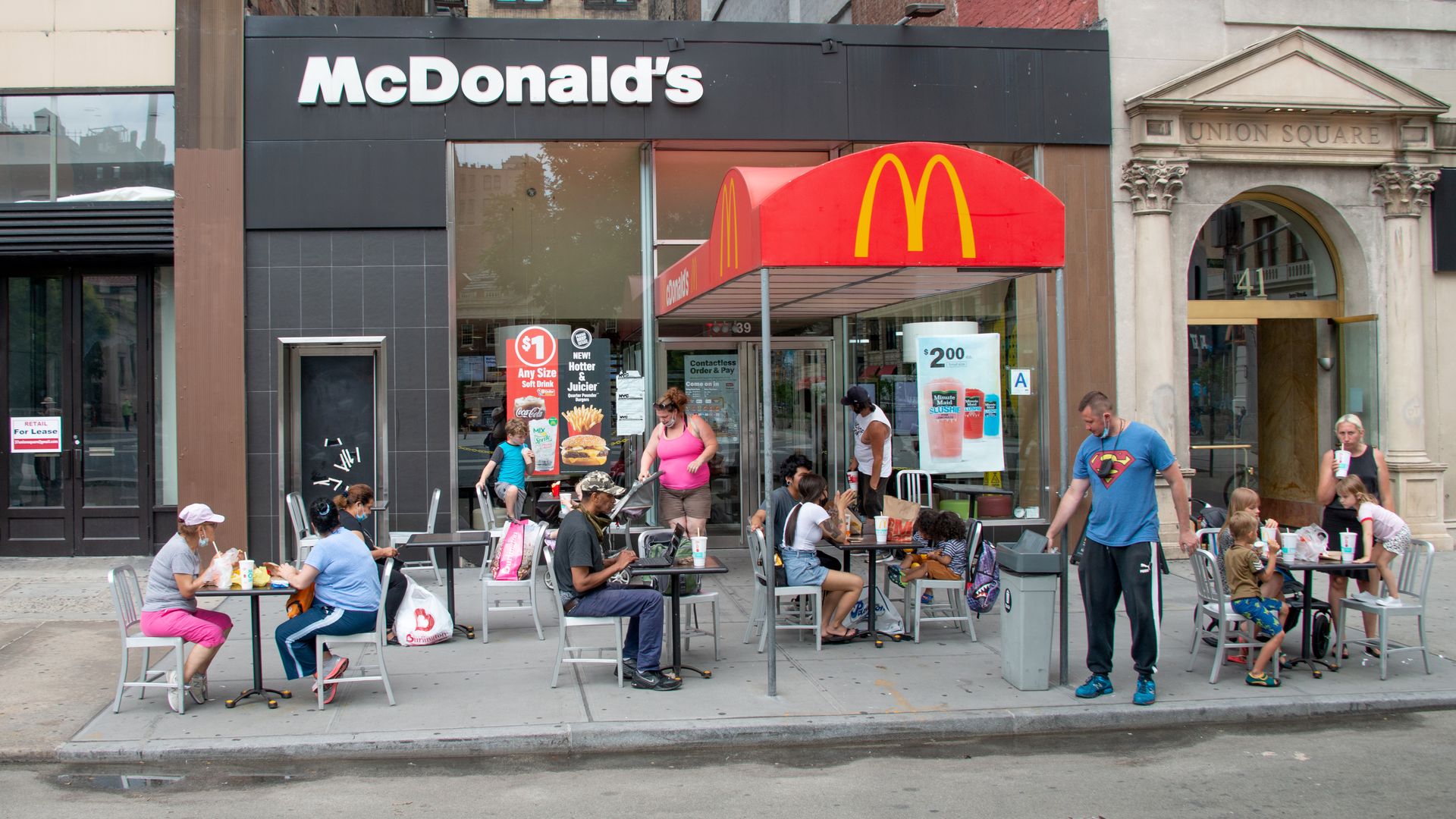 Customers sit outside a McDonalds 