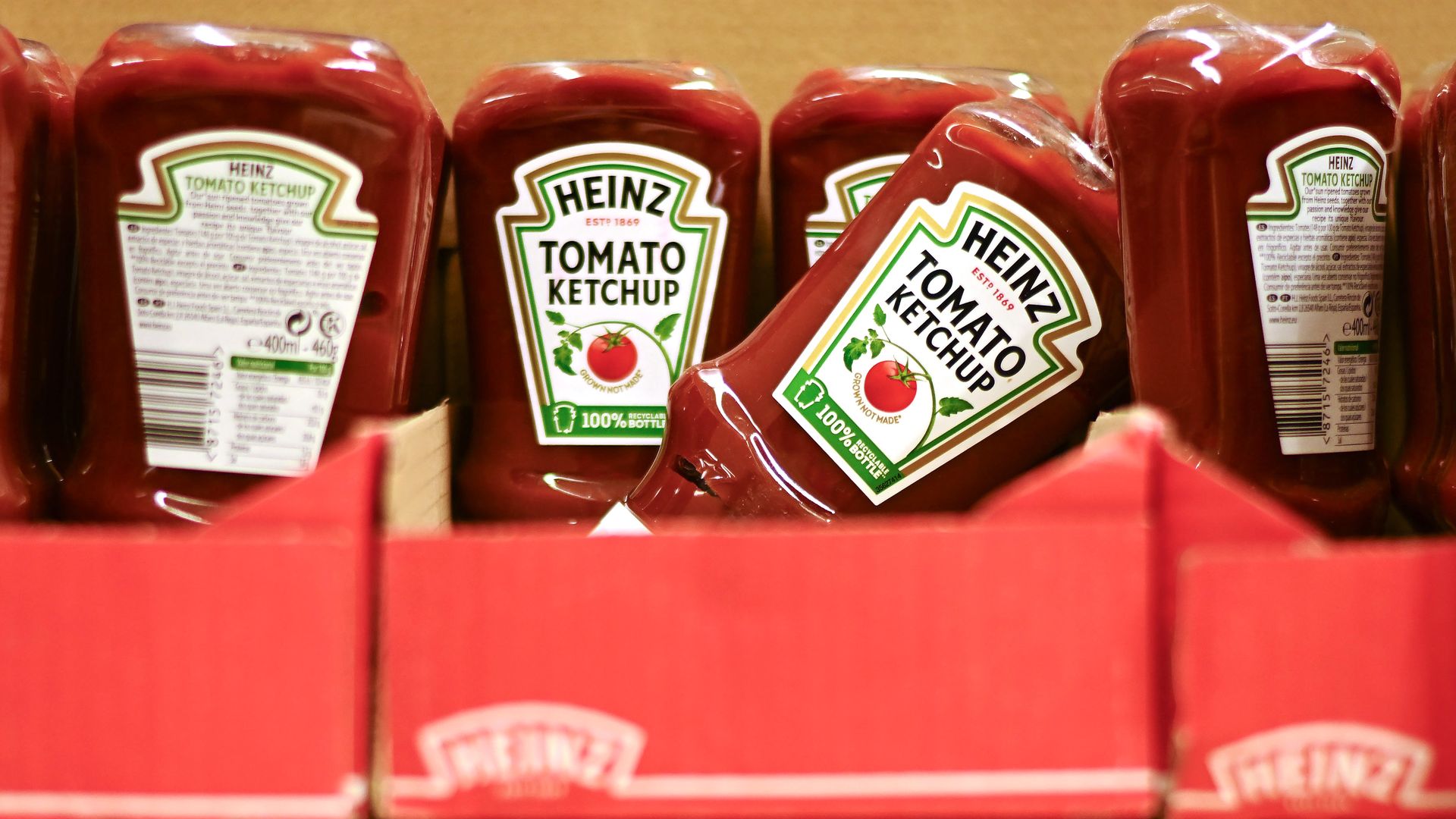 Bottles of Heinz ketchup on a store shelf