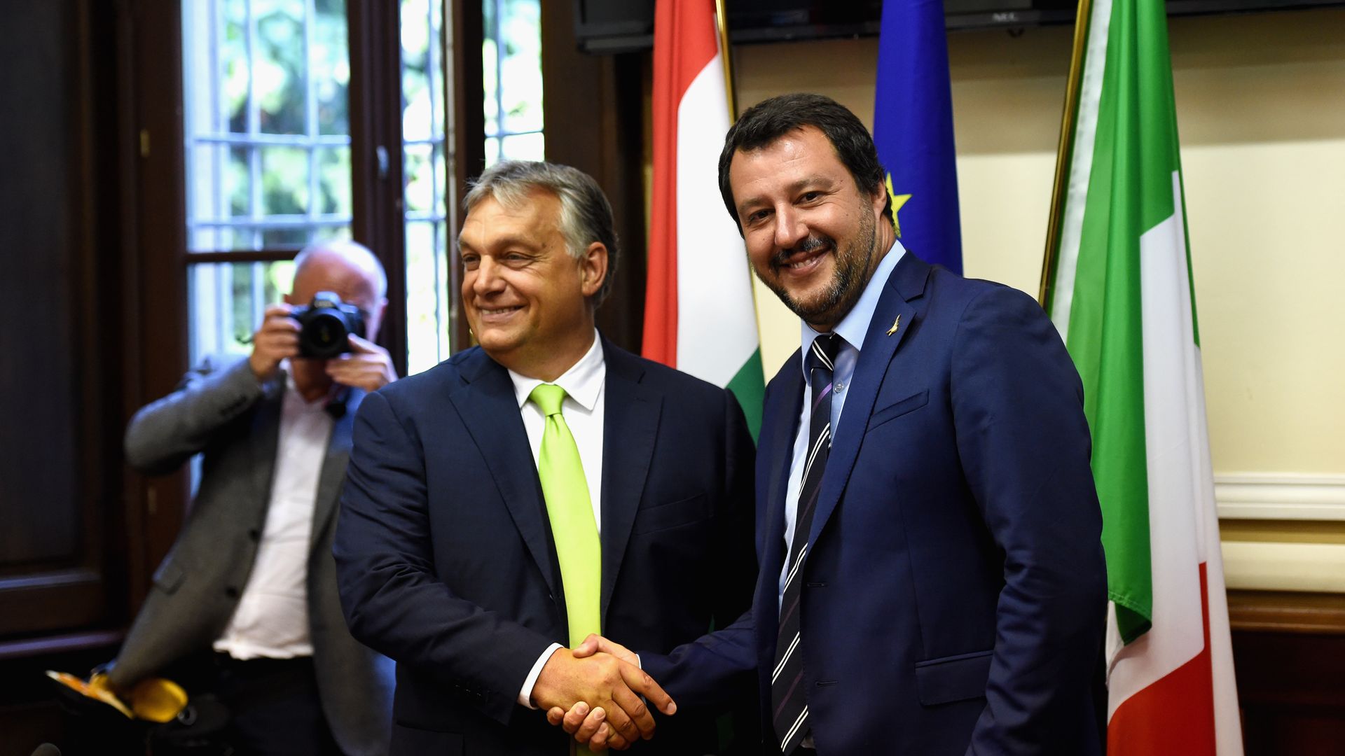Viktor Orban and Matteo Salvini shaking hands