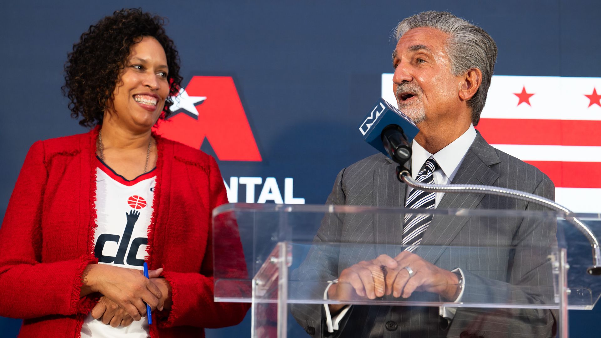 Muriel Bowser and Ted Leonsis at a podium