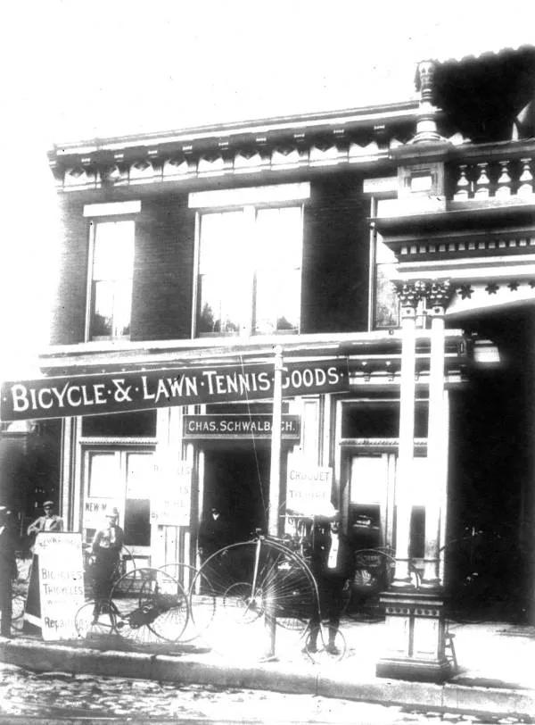 A historic black and white photo of a bike shop in Tampa Bay