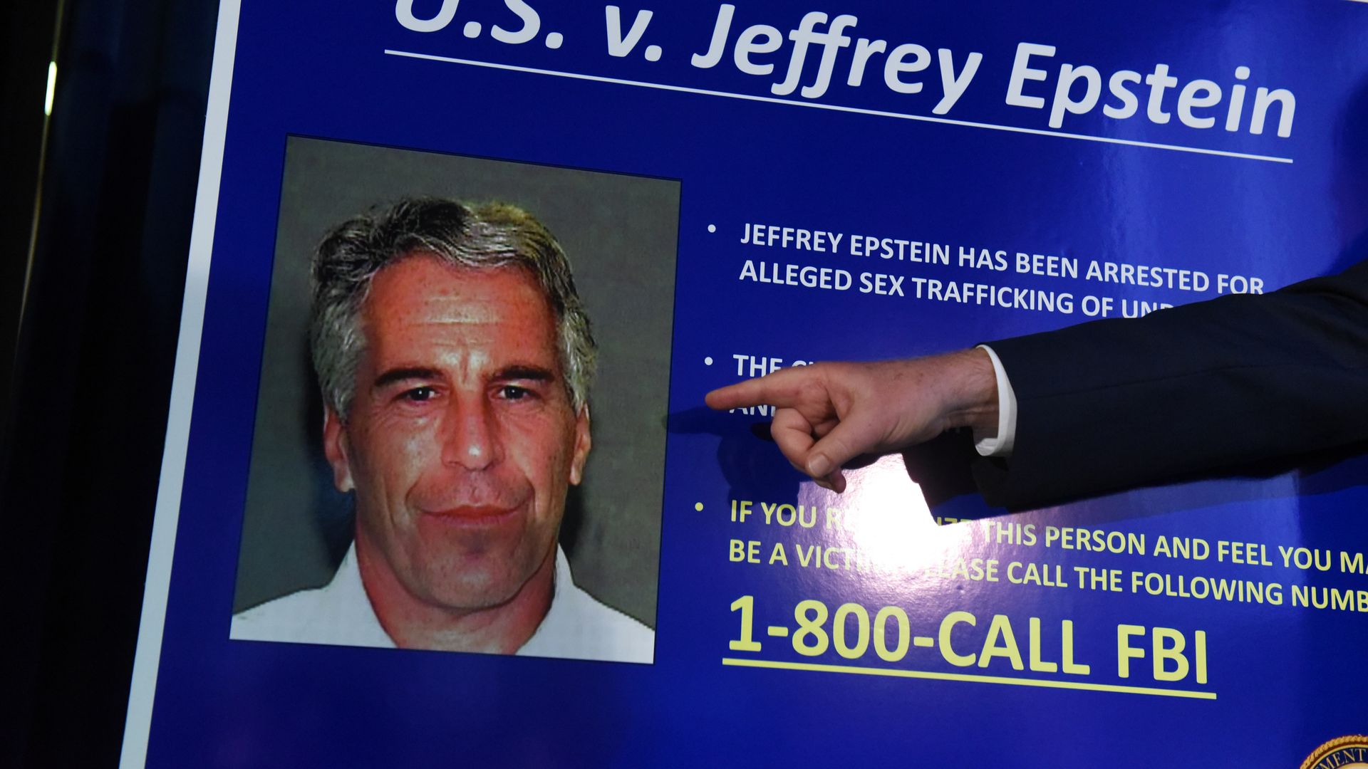 A blue legal case board titled "U.S. v. Jeffrey Epstein" with a photo of Epstein and text about his arrest for alleged sex trafficking. A hand points at the board near an FBI tip line.