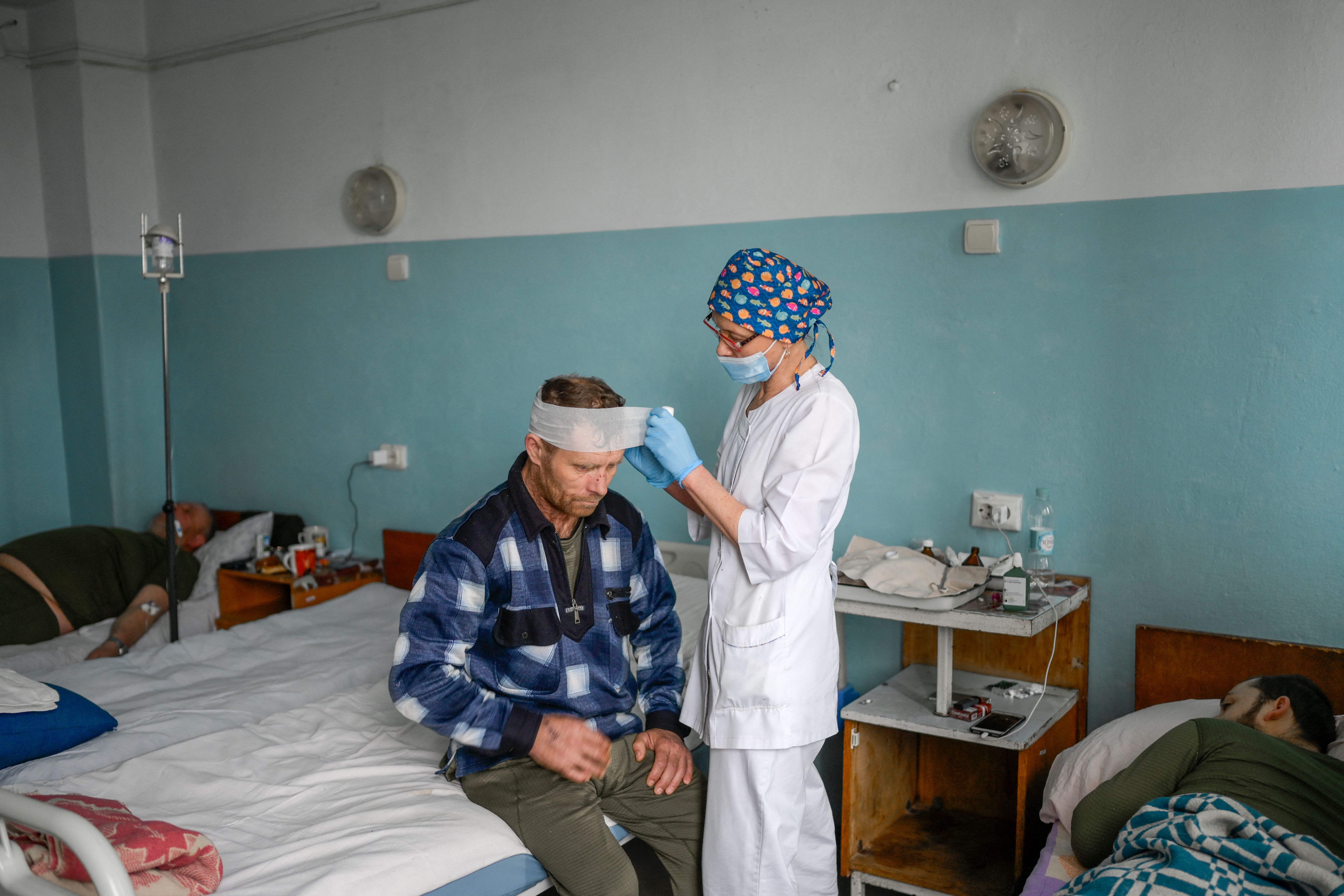 A Ukrainian man injured during Russian attack receives treatment in the central hospital of Mykolaiv, 100km away from Odessa, western Ukraine on March 8.