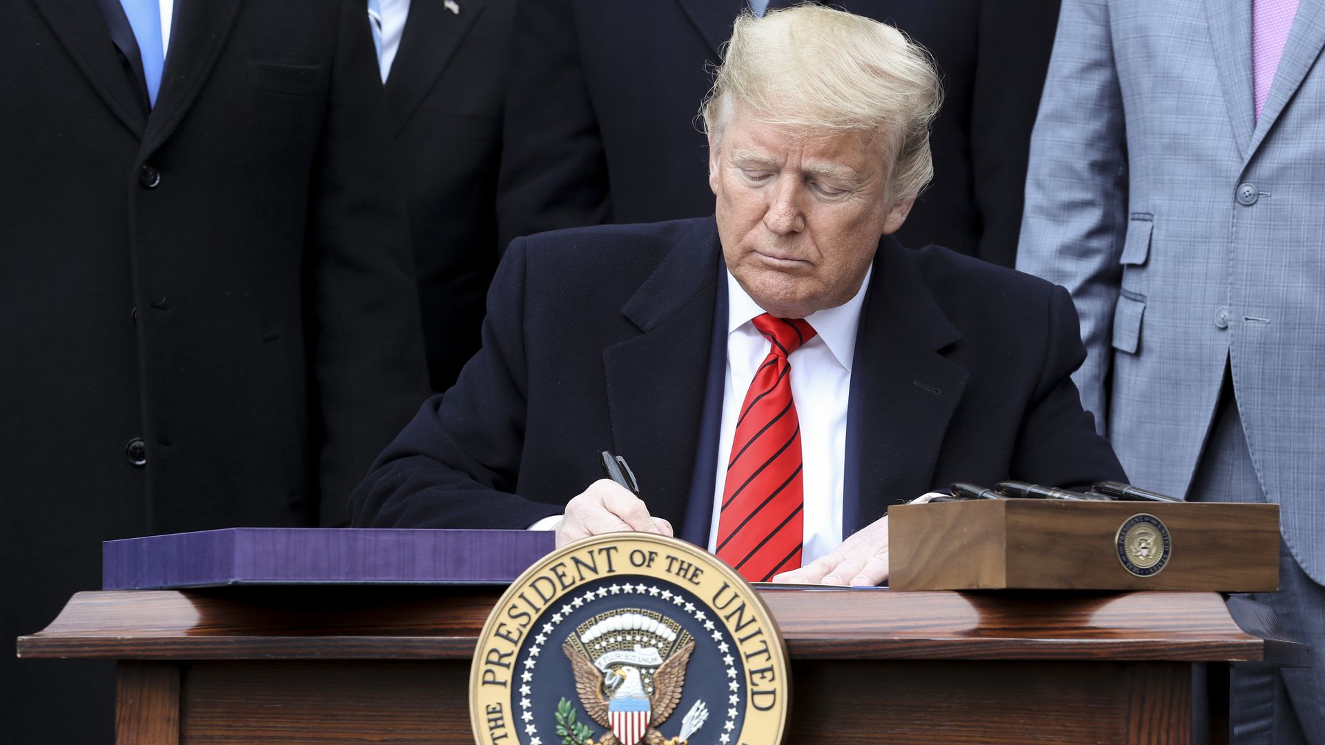 Trump imposes Canada, Mexico, China tariffs, potentially sparking trade war