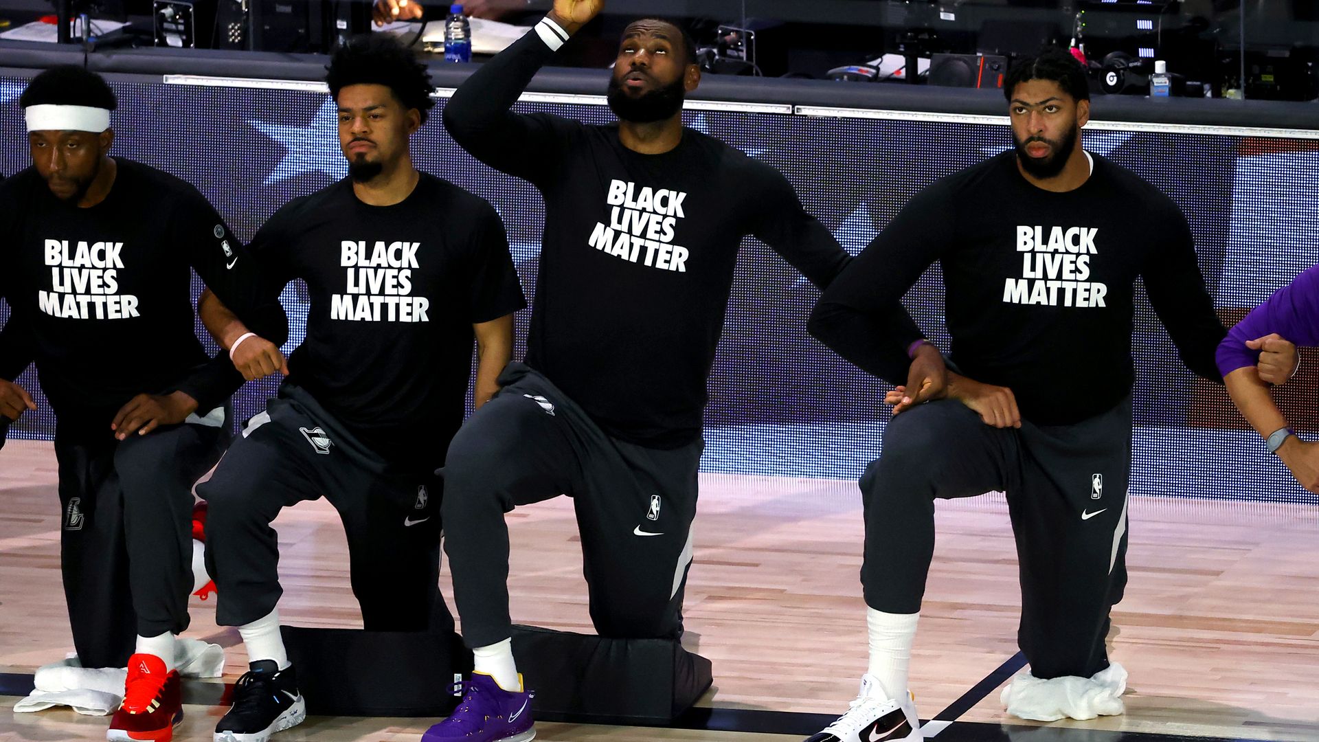 LeBron Jamesof the Los Angeles Lakers kneels during the national anthem prior to the game against the Oklahoma City Thunder on Aug. 5