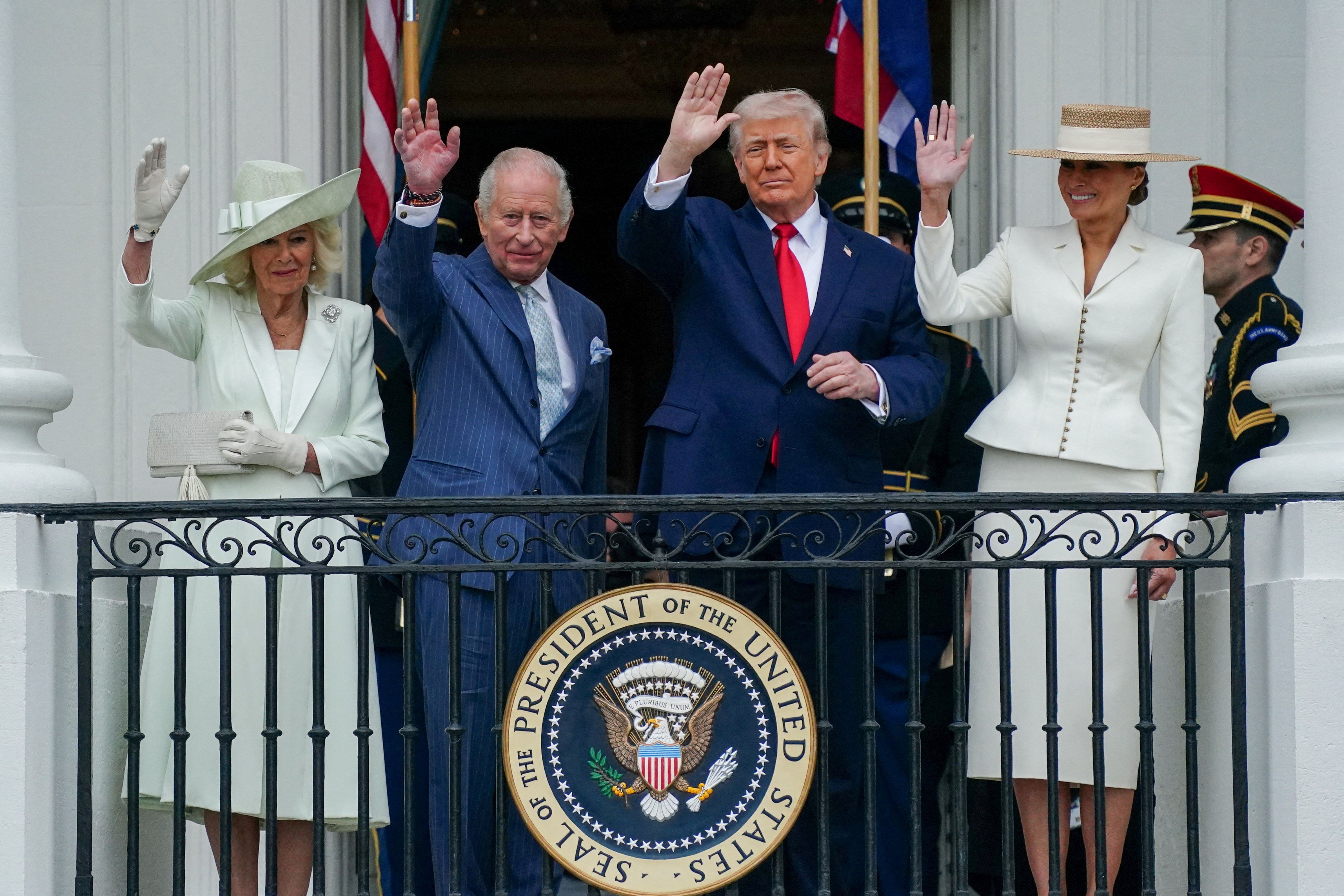 U.S. President Donald Trump, first lady Melania Trump, Britain's King Charles and Queen Camilla wave during an arrival ceremony at the White House in Washington, D.C., U.S., April 28, 2026. REUTERS/Nathan Howar
